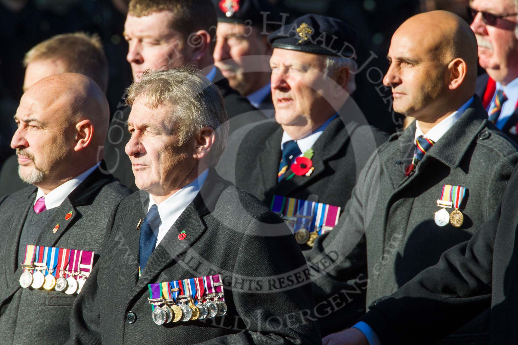 Remembrance Sunday at the Cenotaph in London 2014: Group B19 - Royal Electrical & Mechanical Engineers Association.
Press stand opposite the Foreign Office building, Whitehall, London SW1,
London,
Greater London,
United Kingdom,
on 09 November 2014 at 12:10, image #1717