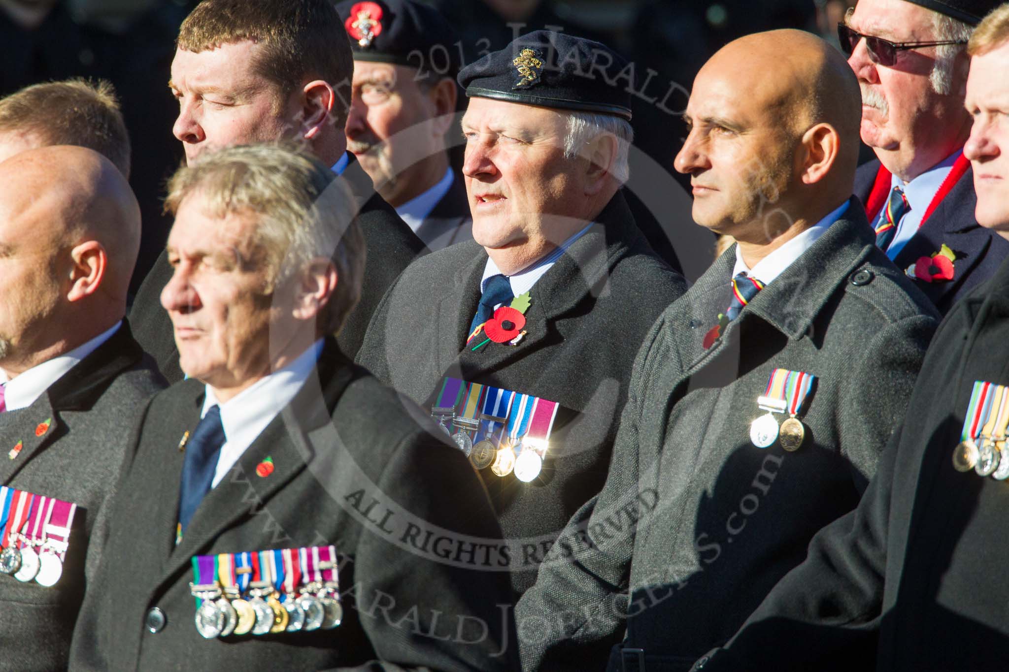 Remembrance Sunday at the Cenotaph in London 2014: Group B19 - Royal Electrical & Mechanical Engineers Association.
Press stand opposite the Foreign Office building, Whitehall, London SW1,
London,
Greater London,
United Kingdom,
on 09 November 2014 at 12:10, image #1718