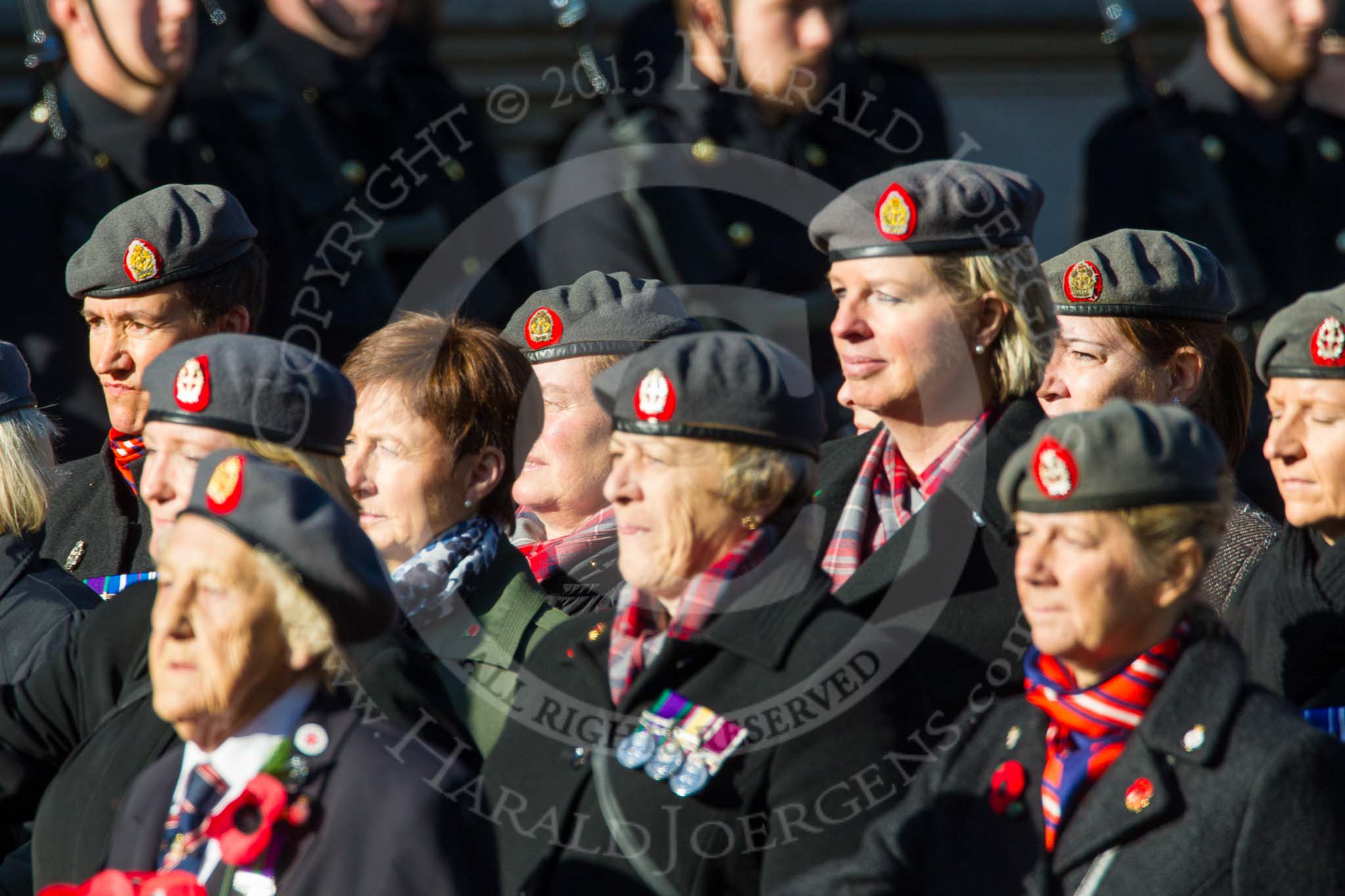 Remembrance Sunday at the Cenotaph in London 2014: Group B25 - Queen Alexandra's Royal Army Nursing Corps Association.
Press stand opposite the Foreign Office building, Whitehall, London SW1,
London,
Greater London,
United Kingdom,
on 09 November 2014 at 12:11, image #1791