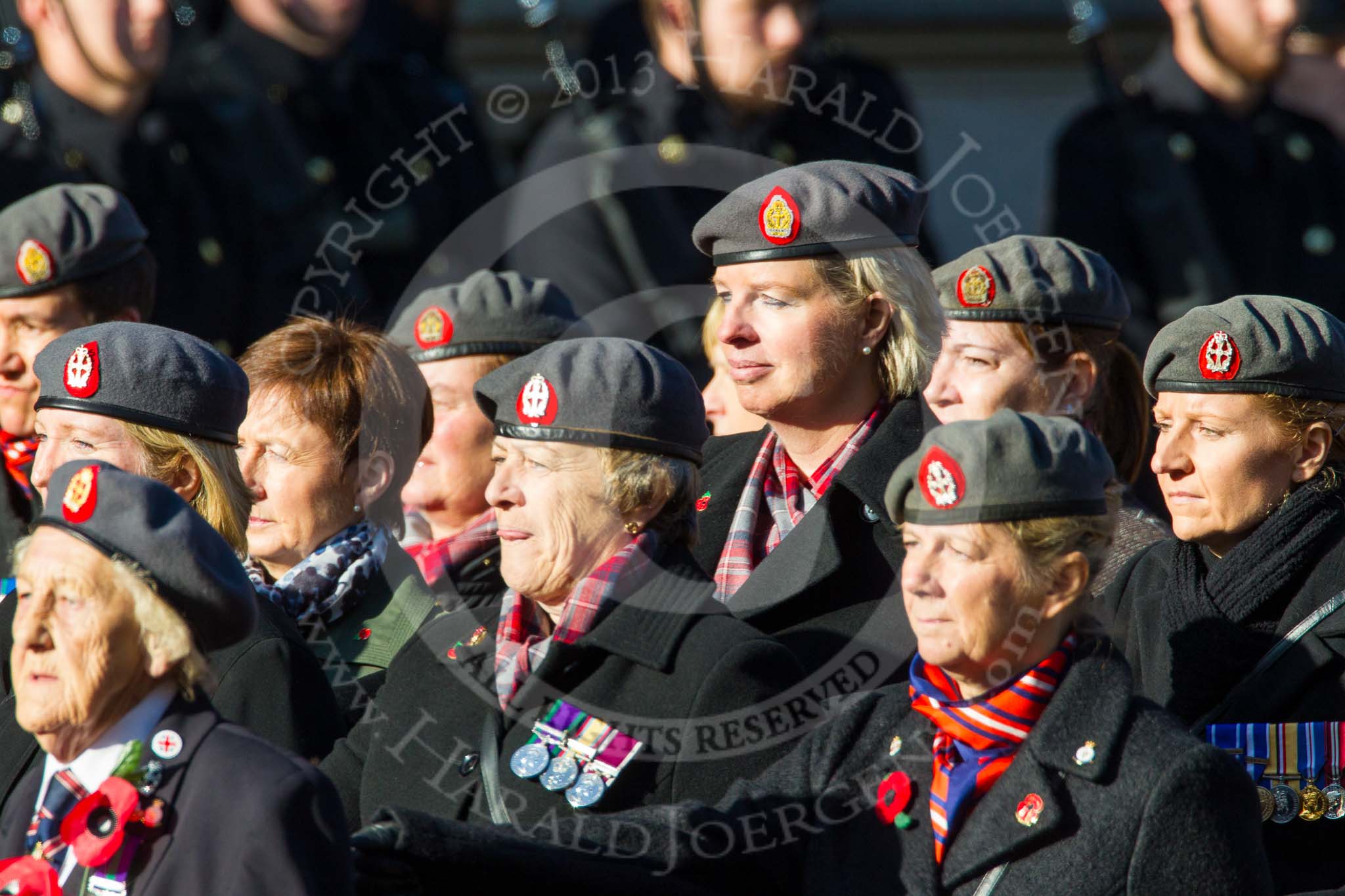 Remembrance Sunday at the Cenotaph in London 2014: Group B25 - Queen Alexandra's Royal Army Nursing Corps Association.
Press stand opposite the Foreign Office building, Whitehall, London SW1,
London,
Greater London,
United Kingdom,
on 09 November 2014 at 12:11, image #1792