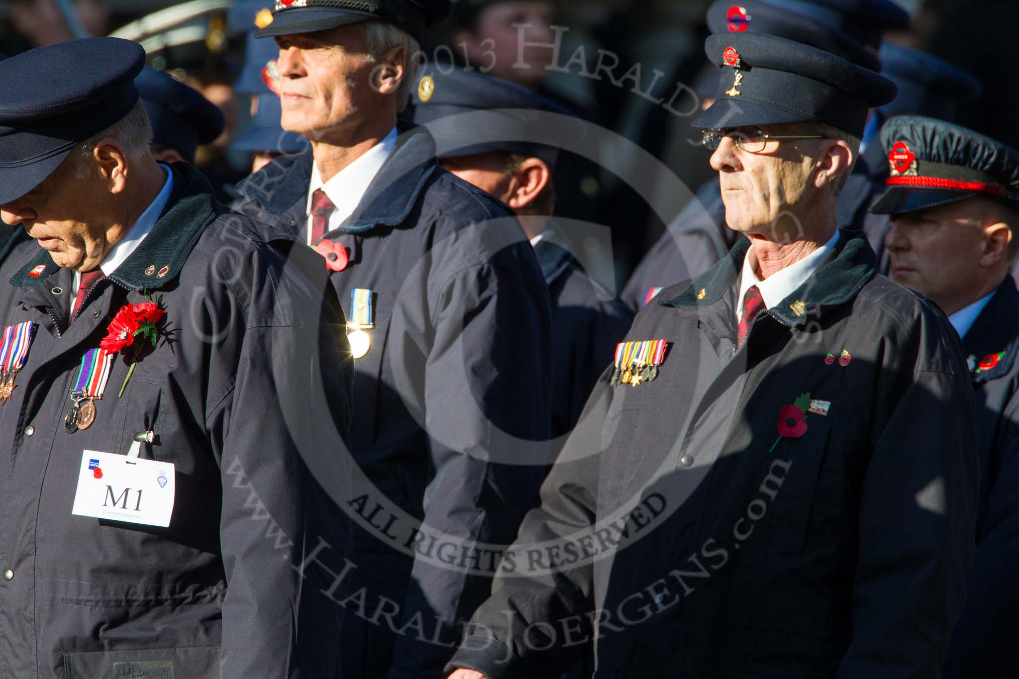 Remembrance Sunday at the Cenotaph in London 2014: Group M1 - Transport For London.
Press stand opposite the Foreign Office building, Whitehall, London SW1,
London,
Greater London,
United Kingdom,
on 09 November 2014 at 12:14, image #1965