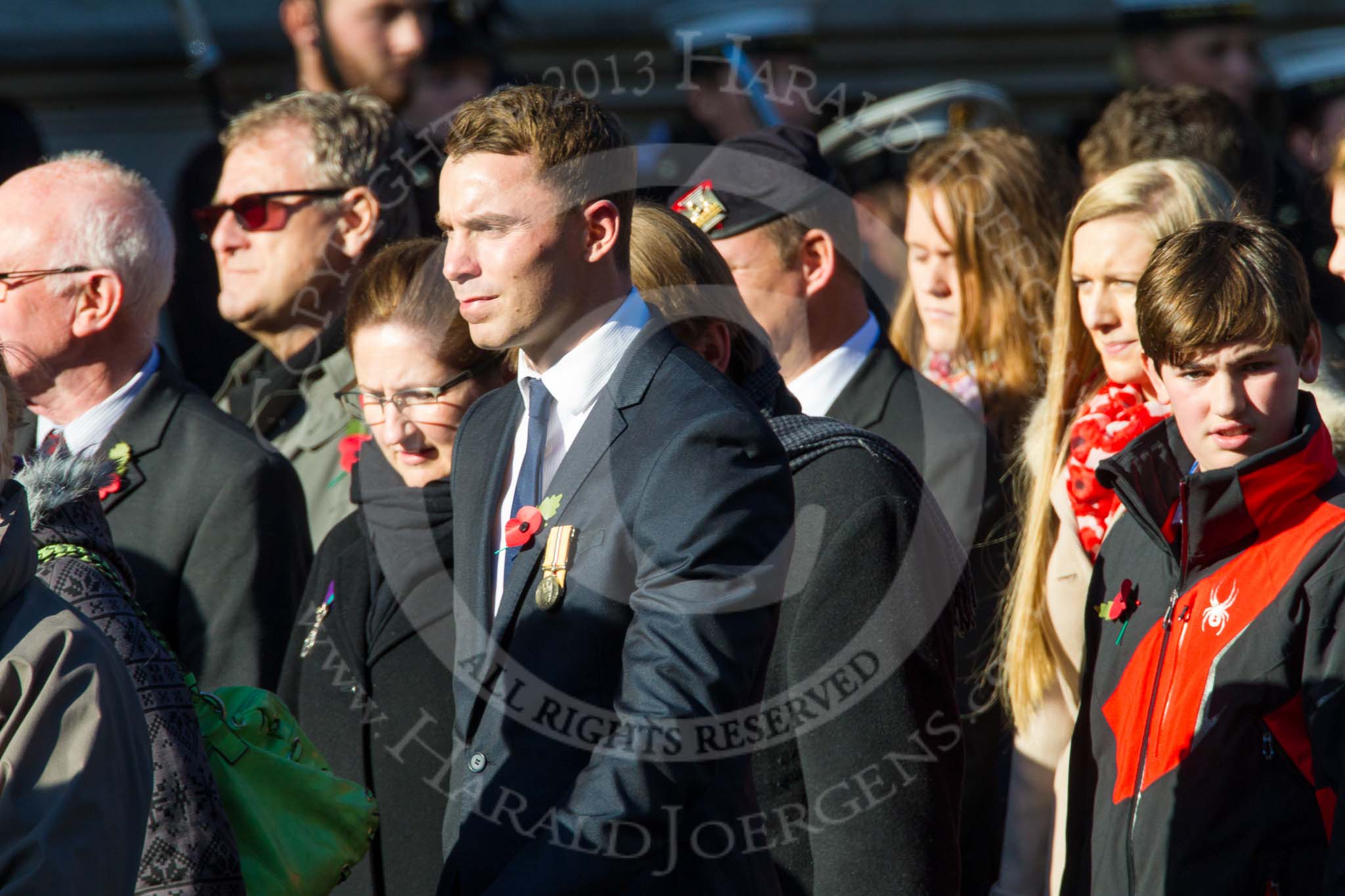 Remembrance Sunday at the Cenotaph in London 2014: Group M4 - Children of the Far East Prisoners of War.
Press stand opposite the Foreign Office building, Whitehall, London SW1,
London,
Greater London,
United Kingdom,
on 09 November 2014 at 12:15, image #1999