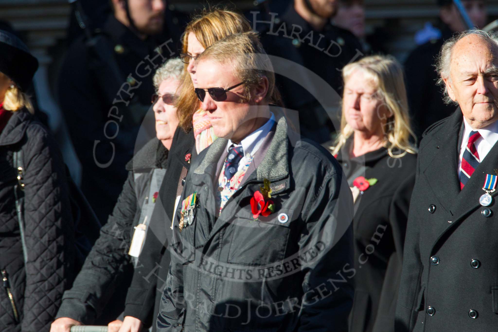 Remembrance Sunday at the Cenotaph in London 2014: Group M5 - Evacuees Reunion Association.
Press stand opposite the Foreign Office building, Whitehall, London SW1,
London,
Greater London,
United Kingdom,
on 09 November 2014 at 12:15, image #2006