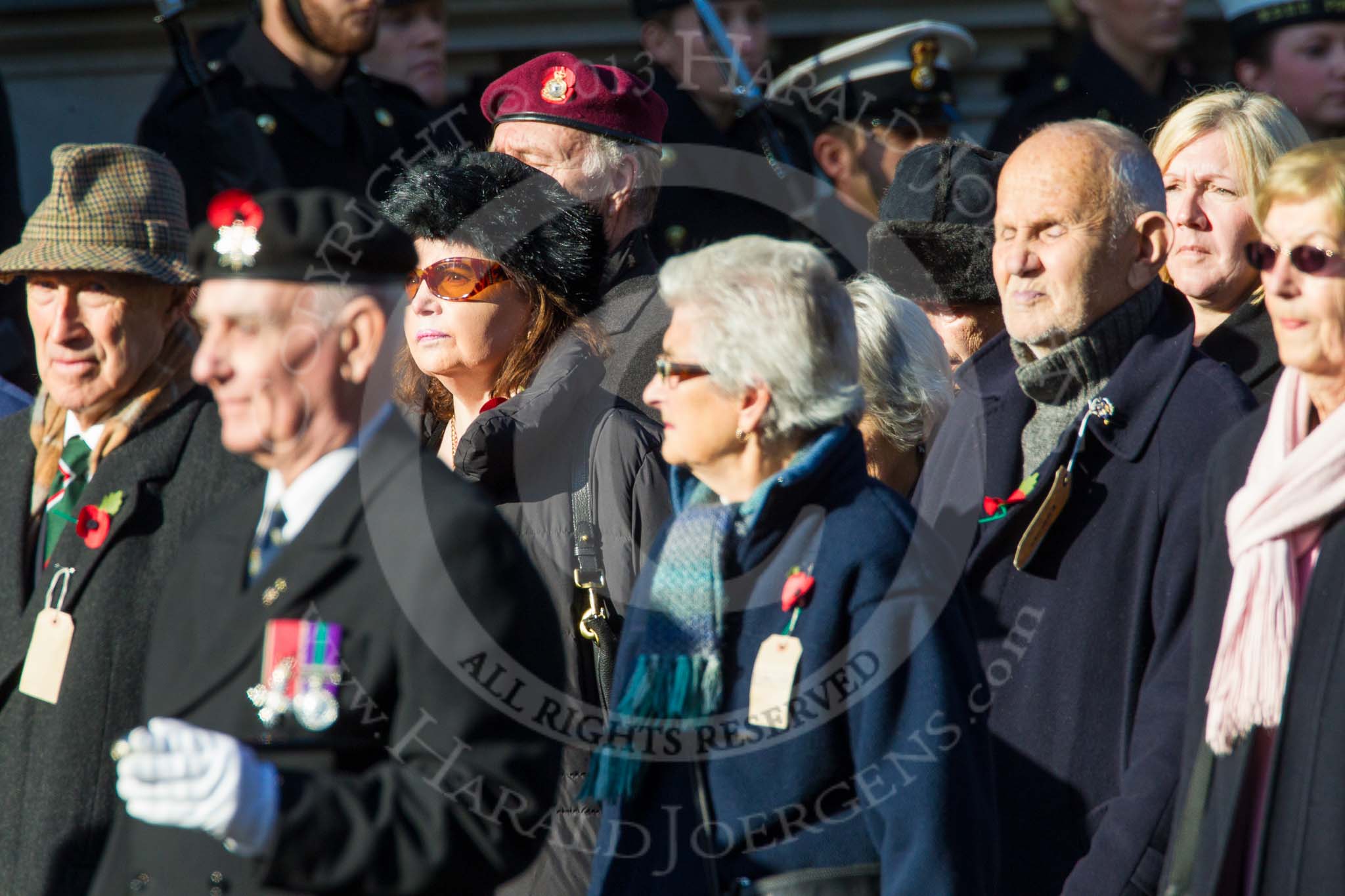 Remembrance Sunday at the Cenotaph in London 2014: Group M5 - Evacuees Reunion Association.
Press stand opposite the Foreign Office building, Whitehall, London SW1,
London,
Greater London,
United Kingdom,
on 09 November 2014 at 12:15, image #2011