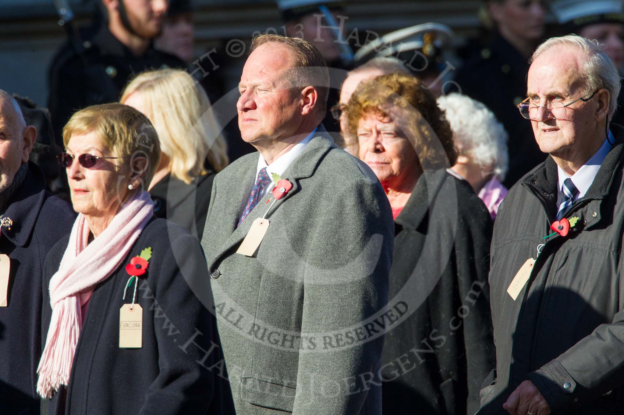 Remembrance Sunday at the Cenotaph in London 2014: Group M5 - Evacuees Reunion Association.
Press stand opposite the Foreign Office building, Whitehall, London SW1,
London,
Greater London,
United Kingdom,
on 09 November 2014 at 12:15, image #2013