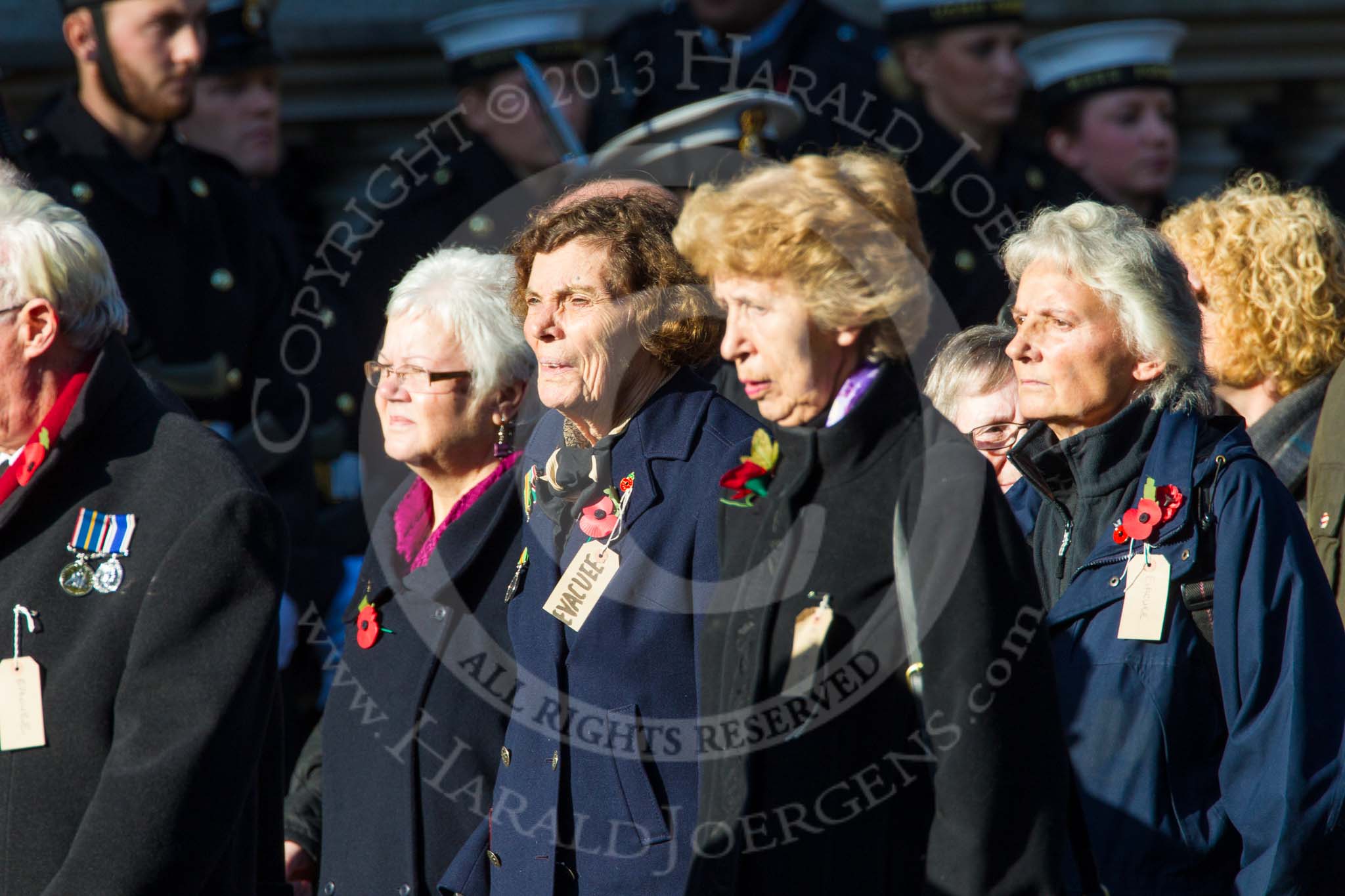Remembrance Sunday at the Cenotaph in London 2014: Group M5 - Evacuees Reunion Association.
Press stand opposite the Foreign Office building, Whitehall, London SW1,
London,
Greater London,
United Kingdom,
on 09 November 2014 at 12:15, image #2019