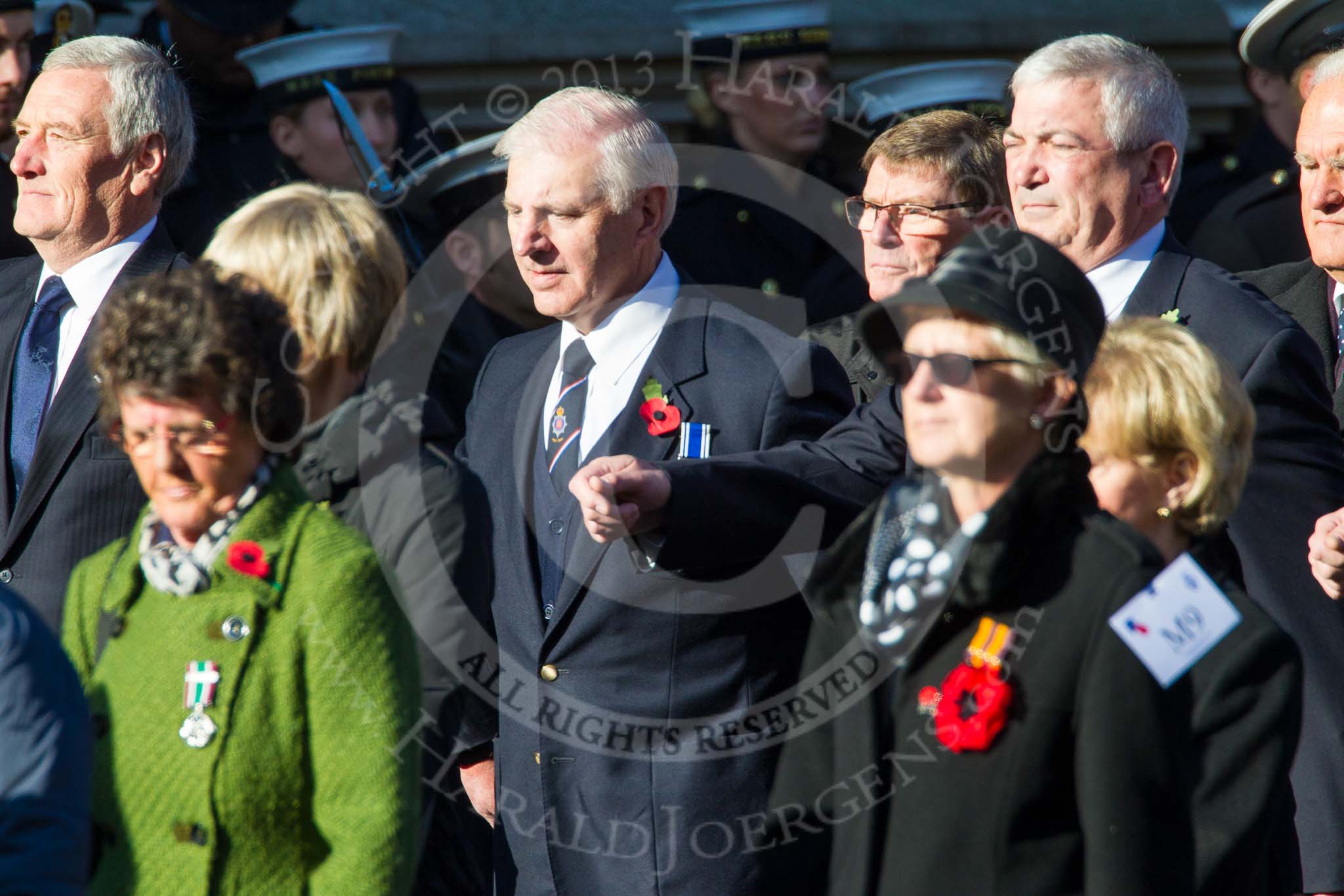 Remembrance Sunday at the Cenotaph in London 2014: Group M9 - Royal Voluntary Service.
Press stand opposite the Foreign Office building, Whitehall, London SW1,
London,
Greater London,
United Kingdom,
on 09 November 2014 at 12:16, image #2044