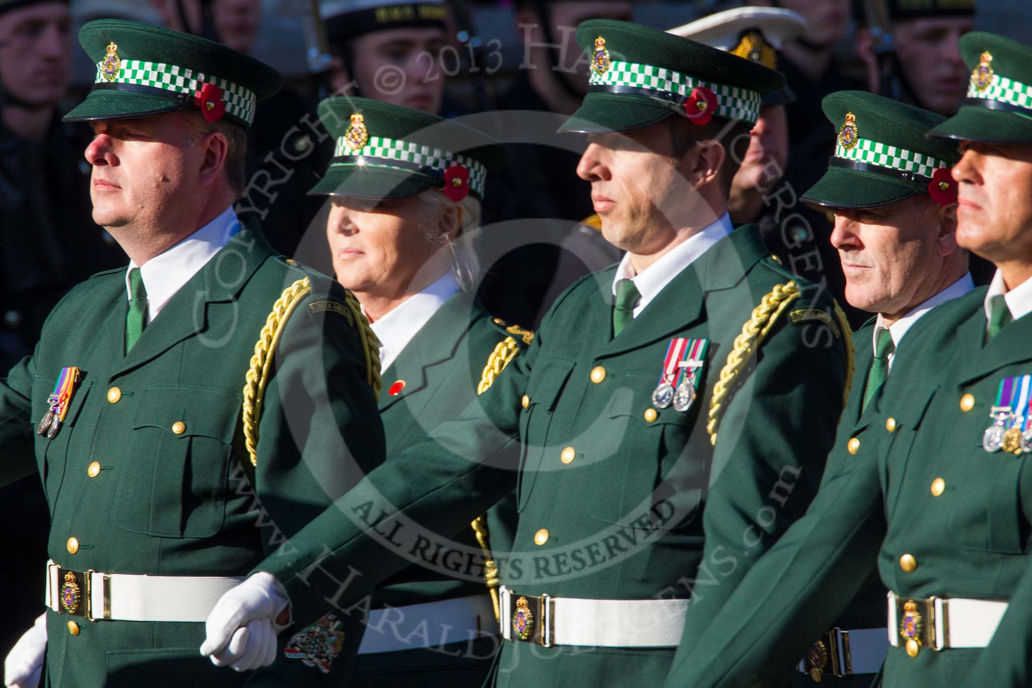 Remembrance Sunday at the Cenotaph in London 2014: Group M13 - London Ambulance Service NHS Trust.
Press stand opposite the Foreign Office building, Whitehall, London SW1,
London,
Greater London,
United Kingdom,
on 09 November 2014 at 12:16, image #2071