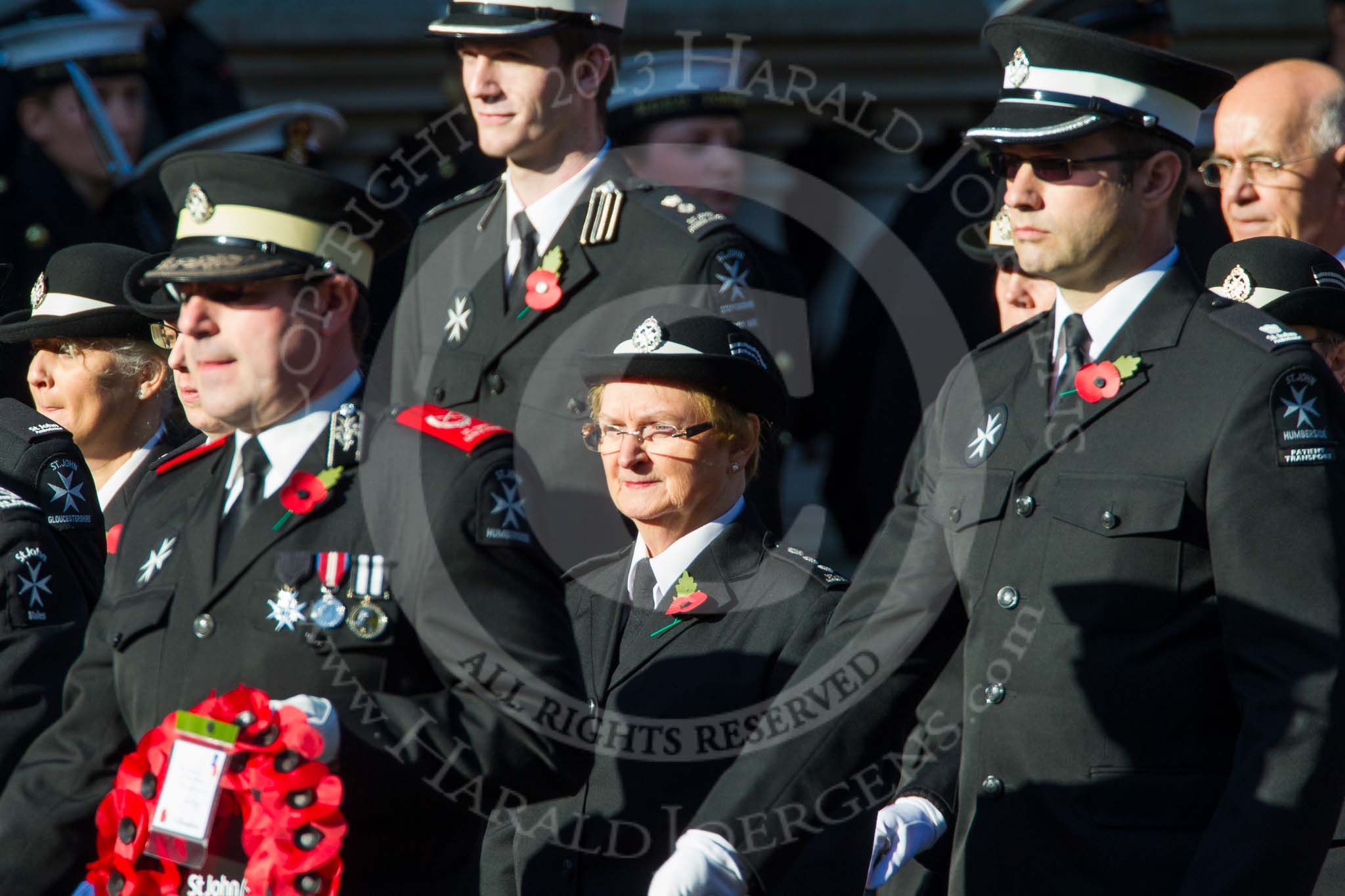 Remembrance Sunday at the Cenotaph in London 2014: Group M15 - St John Ambulance.
Press stand opposite the Foreign Office building, Whitehall, London SW1,
London,
Greater London,
United Kingdom,
on 09 November 2014 at 12:16, image #2088