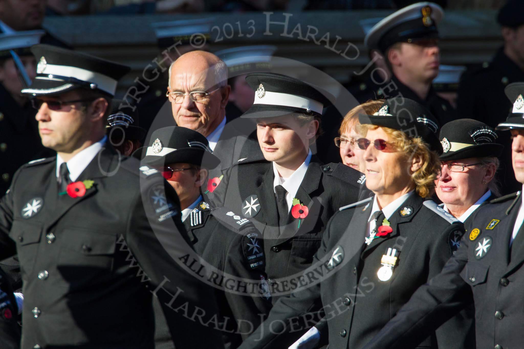Remembrance Sunday at the Cenotaph in London 2014: Group M15 - St John Ambulance.
Press stand opposite the Foreign Office building, Whitehall, London SW1,
London,
Greater London,
United Kingdom,
on 09 November 2014 at 12:16, image #2090