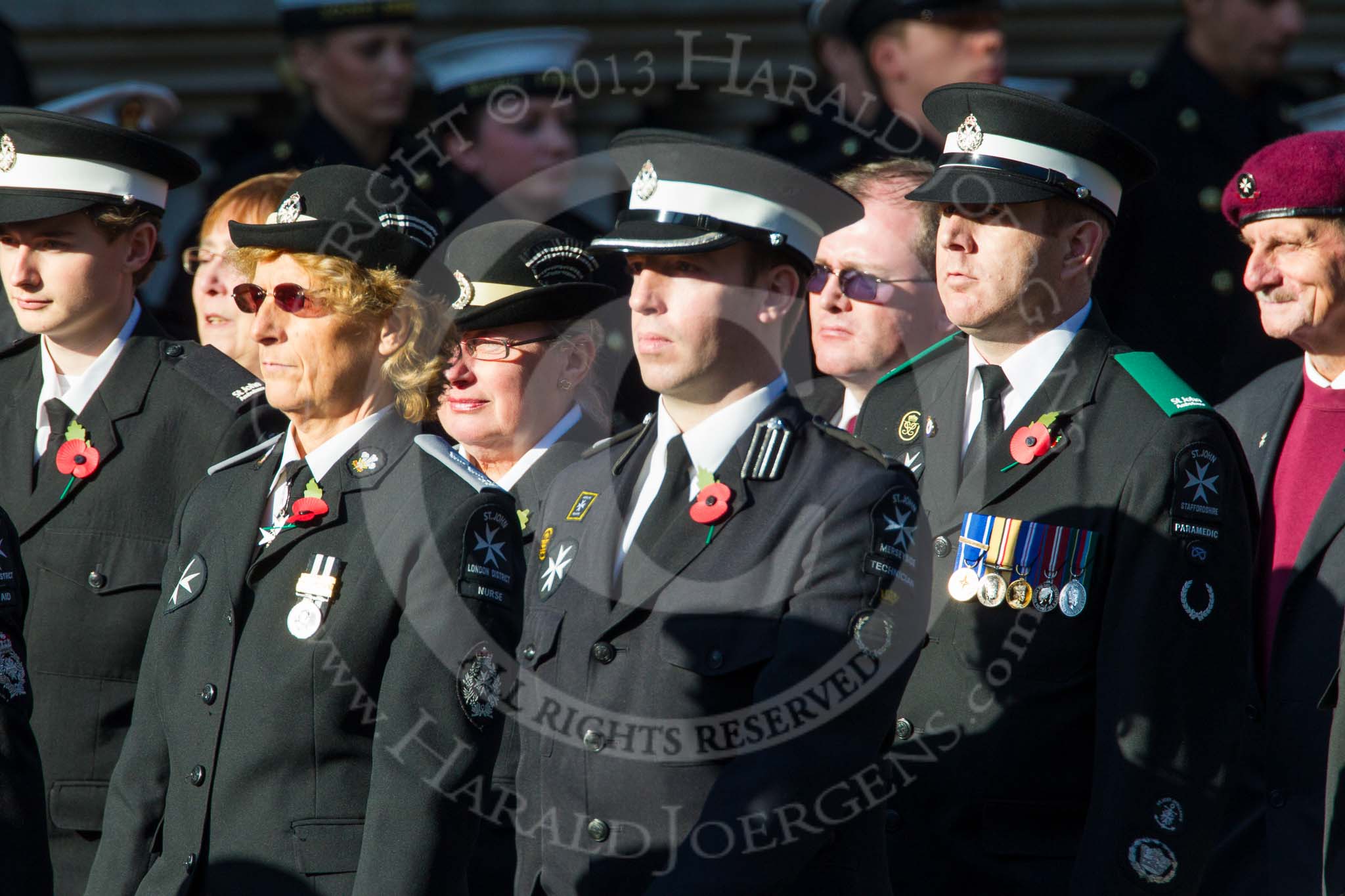 Remembrance Sunday at the Cenotaph in London 2014: Group M15 - St John Ambulance.
Press stand opposite the Foreign Office building, Whitehall, London SW1,
London,
Greater London,
United Kingdom,
on 09 November 2014 at 12:16, image #2091