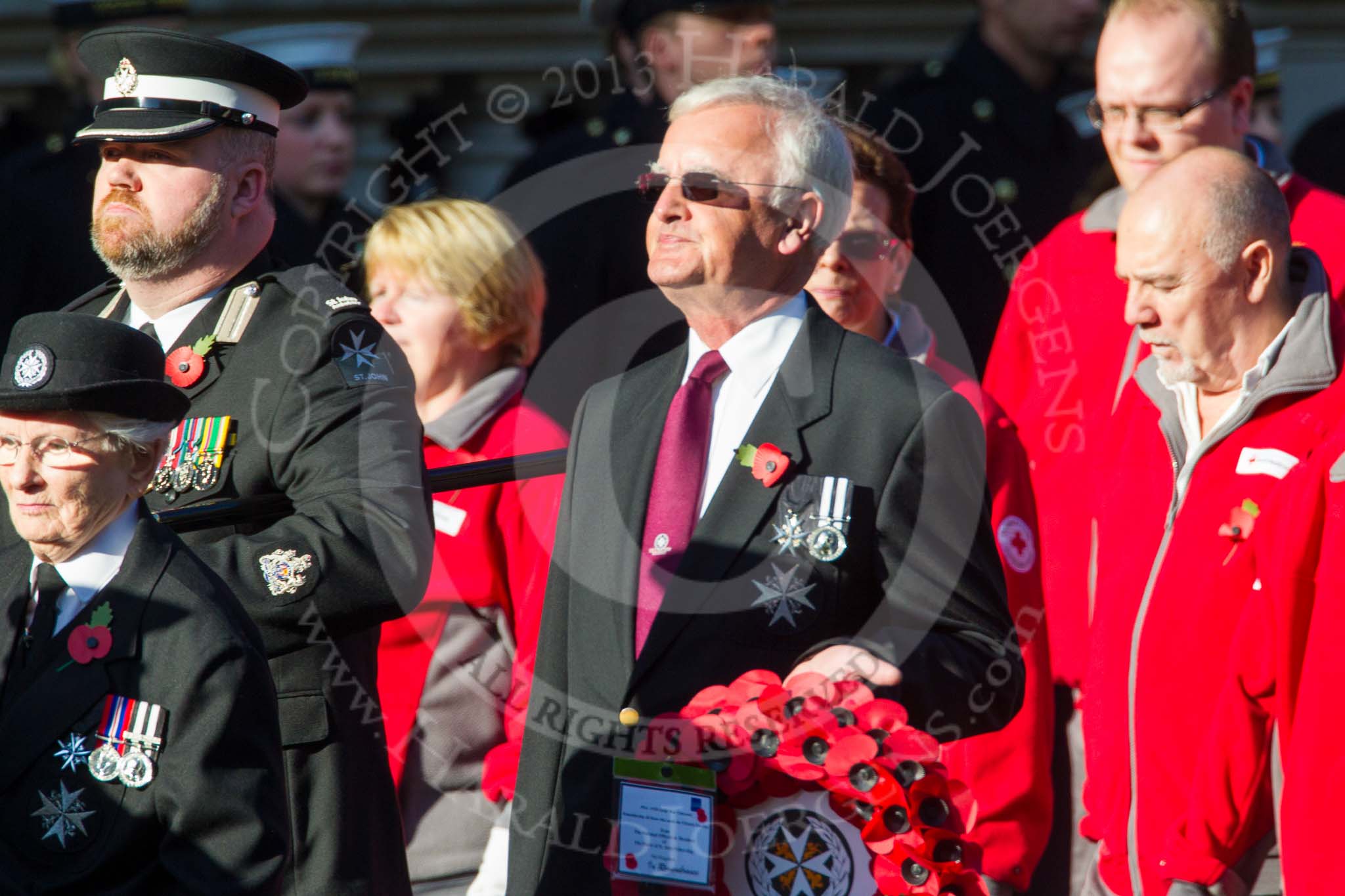 Remembrance Sunday at the Cenotaph in London 2014: Group M15 - St John Ambulance.
Press stand opposite the Foreign Office building, Whitehall, London SW1,
London,
Greater London,
United Kingdom,
on 09 November 2014 at 12:16, image #2095