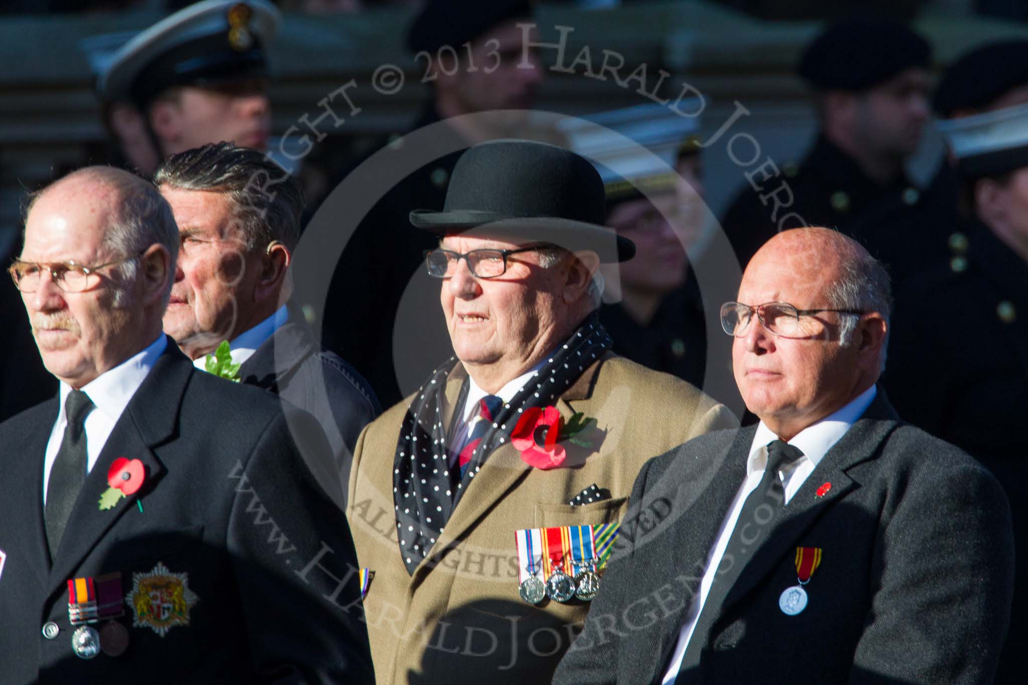 Remembrance Sunday at the Cenotaph in London 2014: Group M18 - The Firefighters Memorial Trust.
Press stand opposite the Foreign Office building, Whitehall, London SW1,
London,
Greater London,
United Kingdom,
on 09 November 2014 at 12:17, image #2108