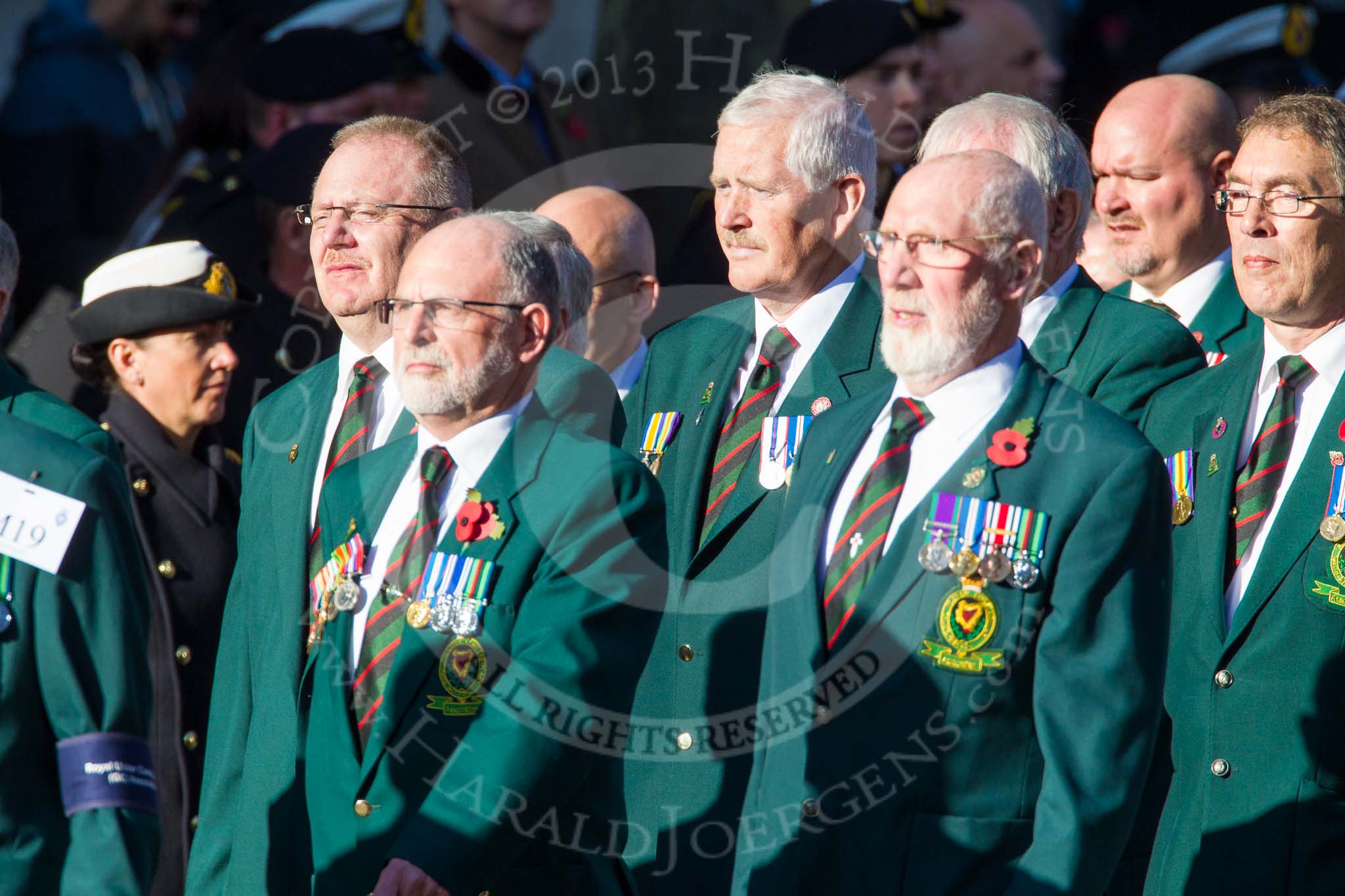Remembrance Sunday at the Cenotaph in London 2014: Group M19 - Royal Ulster Constabulary (GC) Association.
Press stand opposite the Foreign Office building, Whitehall, London SW1,
London,
Greater London,
United Kingdom,
on 09 November 2014 at 12:17, image #2117