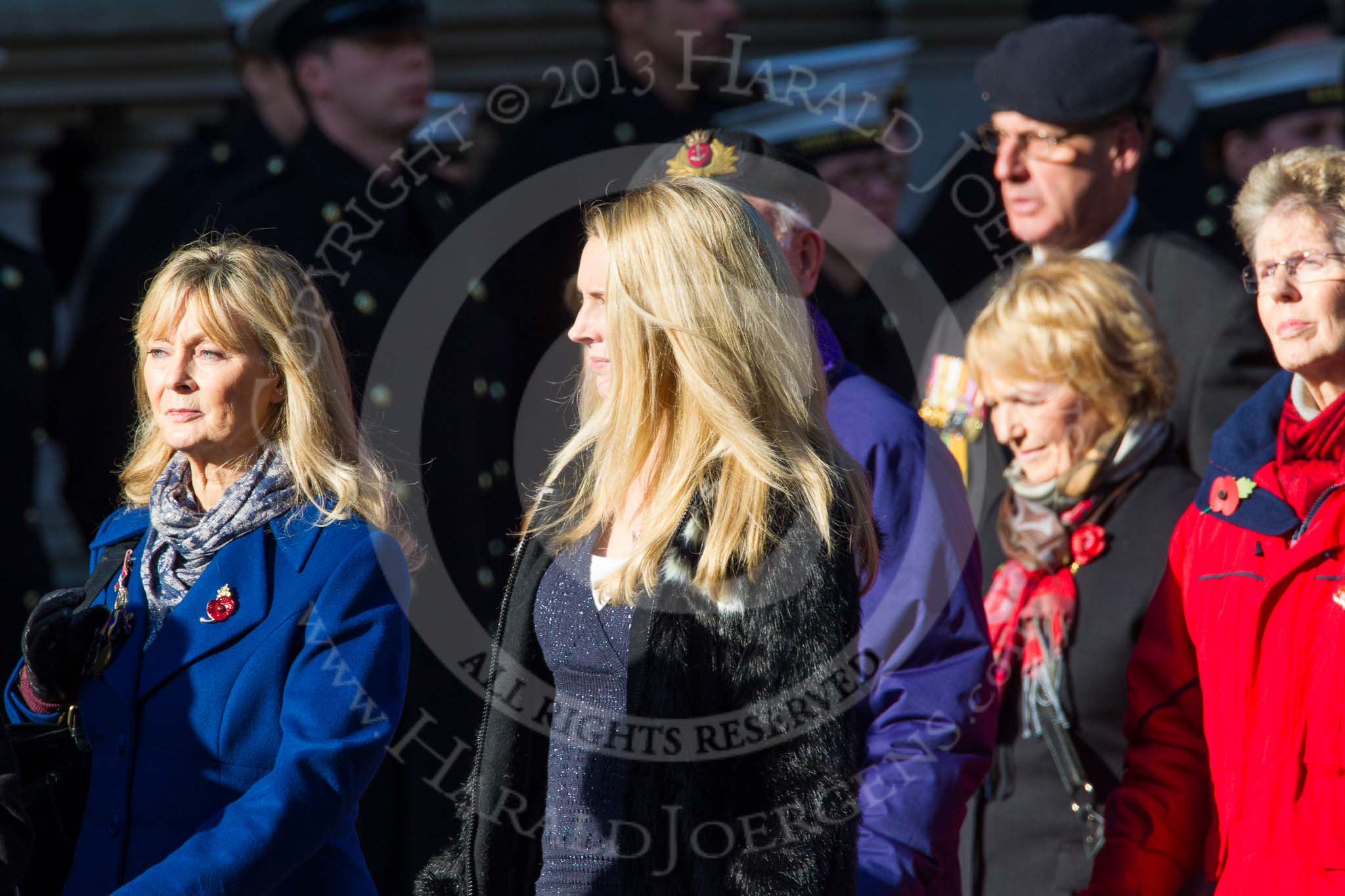 Photo 1411091218181D40040HaraldJoergens Remembrance Sunday at the Cenotaph in London 2014: Group M23 - Civilians Representing Families.
Press stand opposite the Foreign Office building, Whitehall, London SW1,
London,
Greater London,
United Kingdom,
on 09 November 2014 at 12:18, image #2172