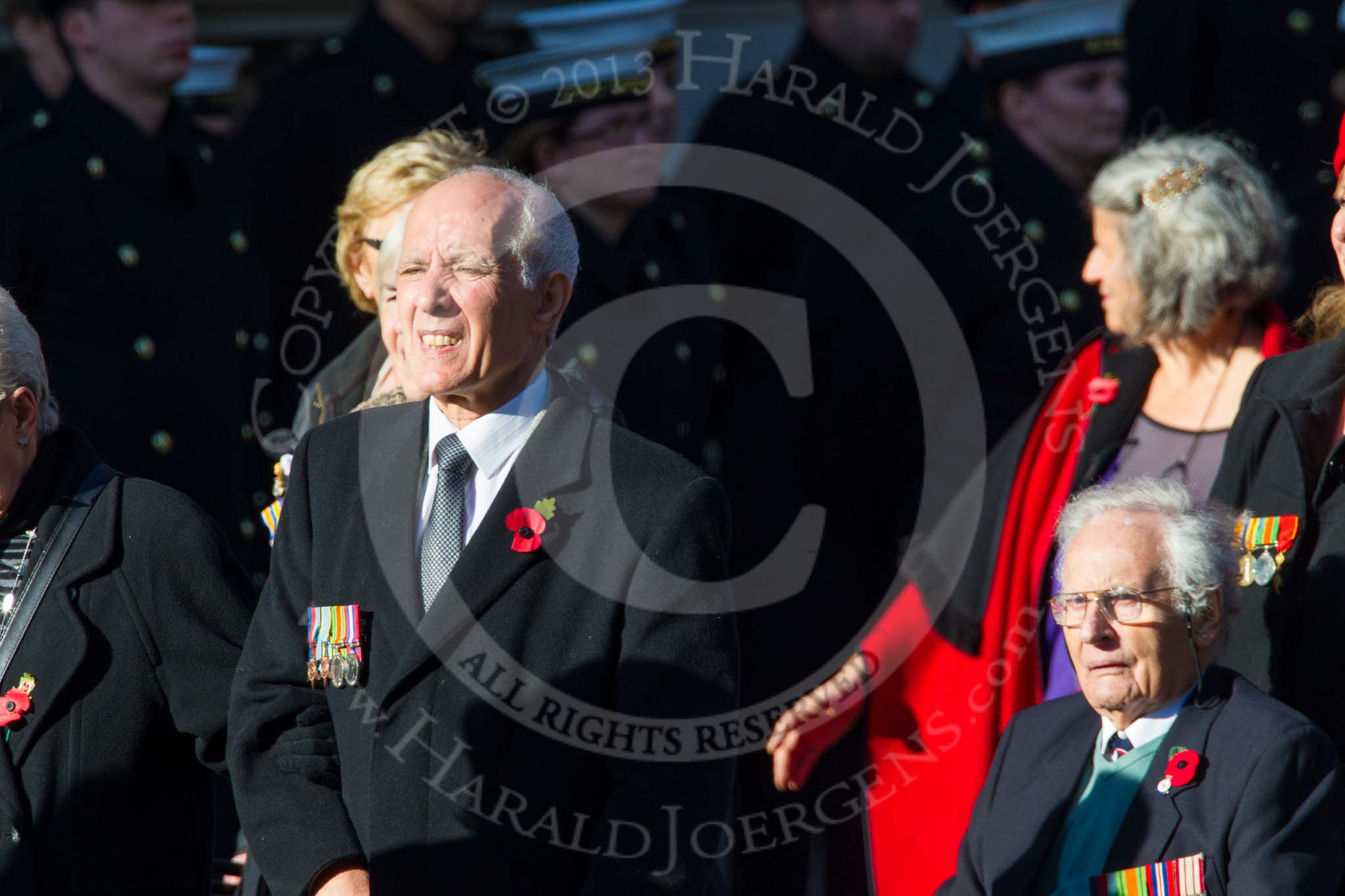 Photo 1411091218221D40050HaraldJoergens Remembrance Sunday at the Cenotaph in London 2014: Group M23 - Civilians Representing Families.
Press stand opposite the Foreign Office building, Whitehall, London SW1,
London,
Greater London,
United Kingdom,
on 09 November 2014 at 12:18, image #2177