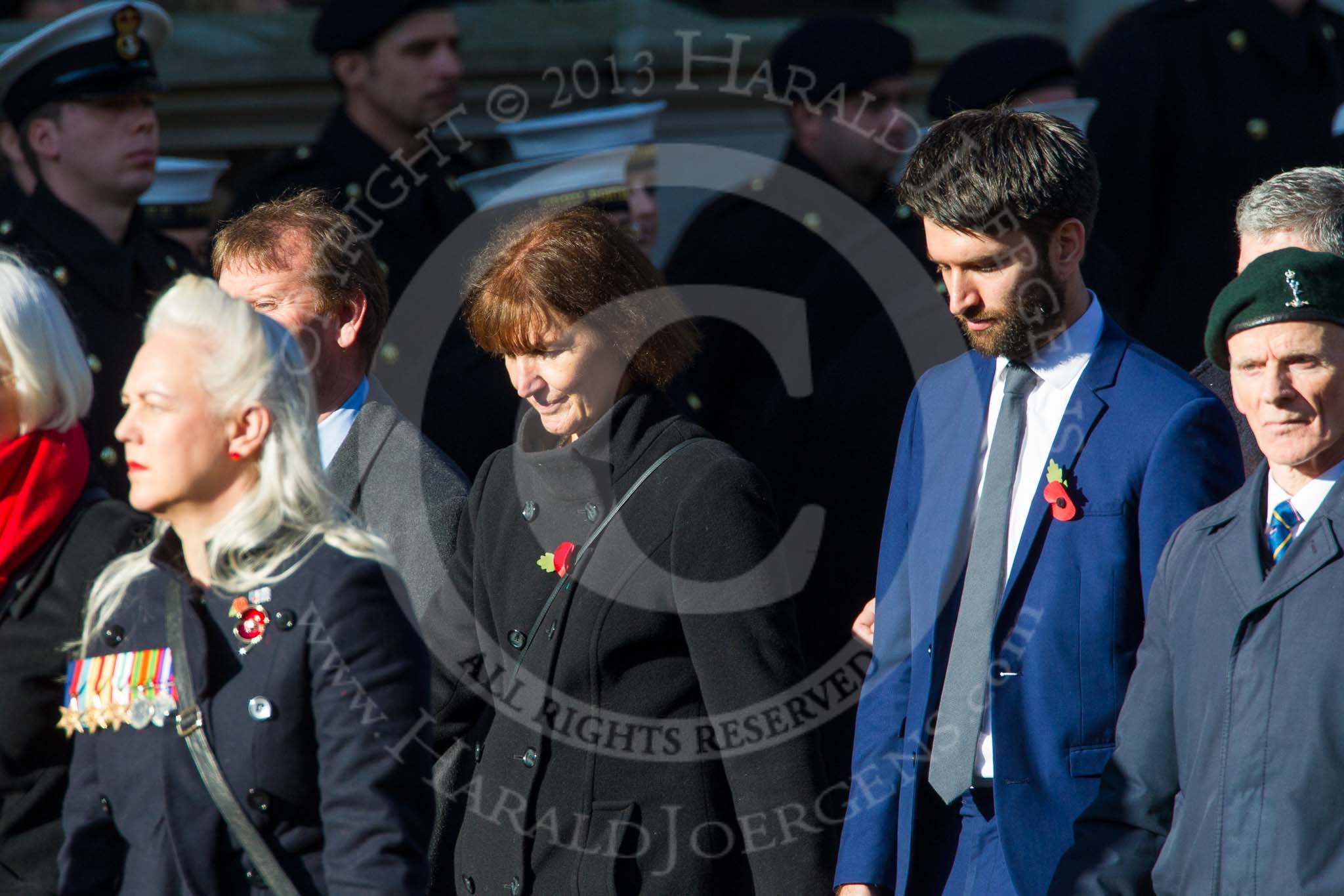 Remembrance Sunday at the Cenotaph in London 2014: Group M24 - Royal Mail Group Ltd.
Press stand opposite the Foreign Office building, Whitehall, London SW1,
London,
Greater London,
United Kingdom,
on 09 November 2014 at 12:18, image #2183