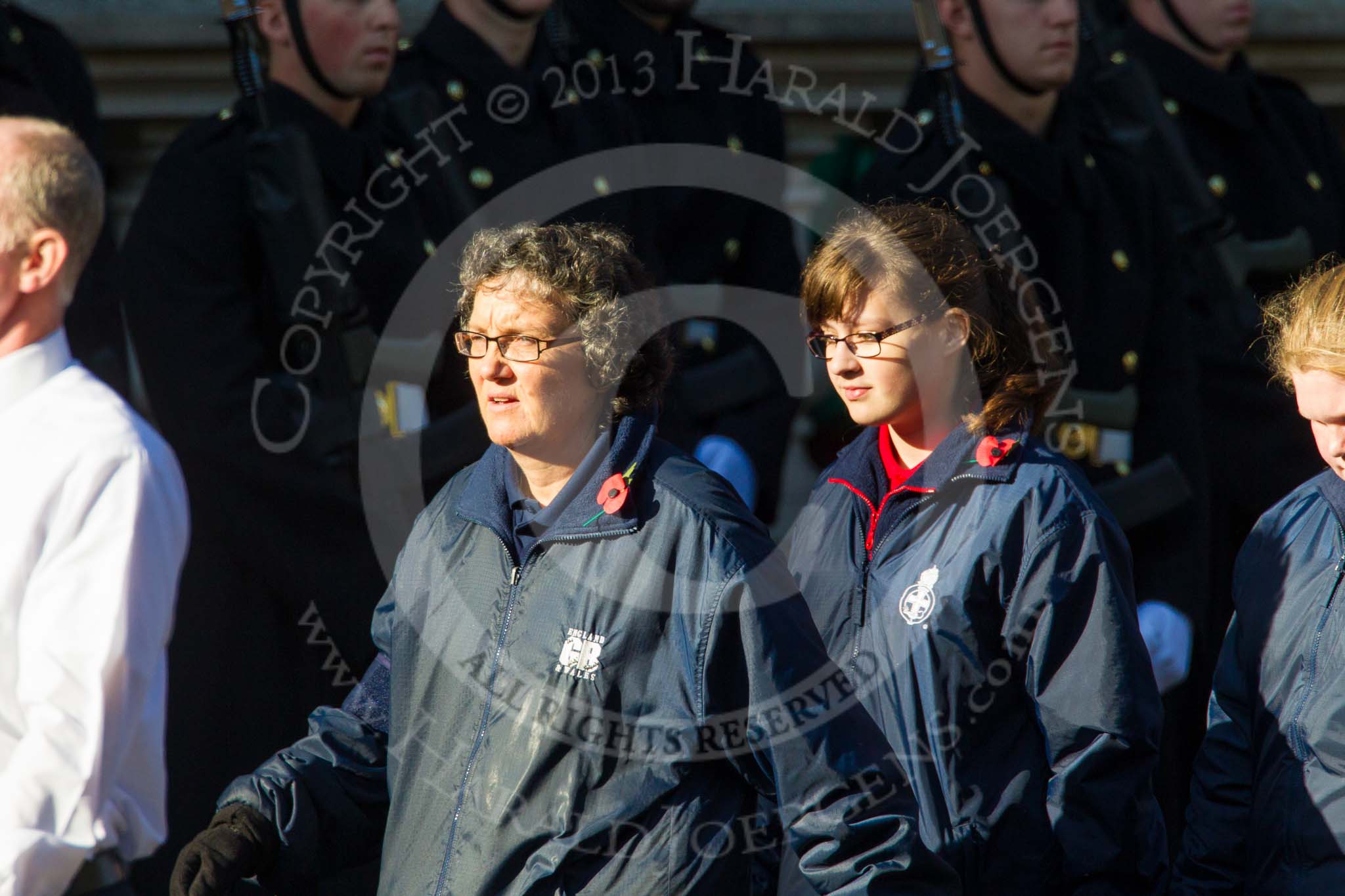 Remembrance Sunday at the Cenotaph in London 2014: Group M52 - Girls Brigade England & Wales.
Press stand opposite the Foreign Office building, Whitehall, London SW1,
London,
Greater London,
United Kingdom,
on 09 November 2014 at 12:21, image #2331