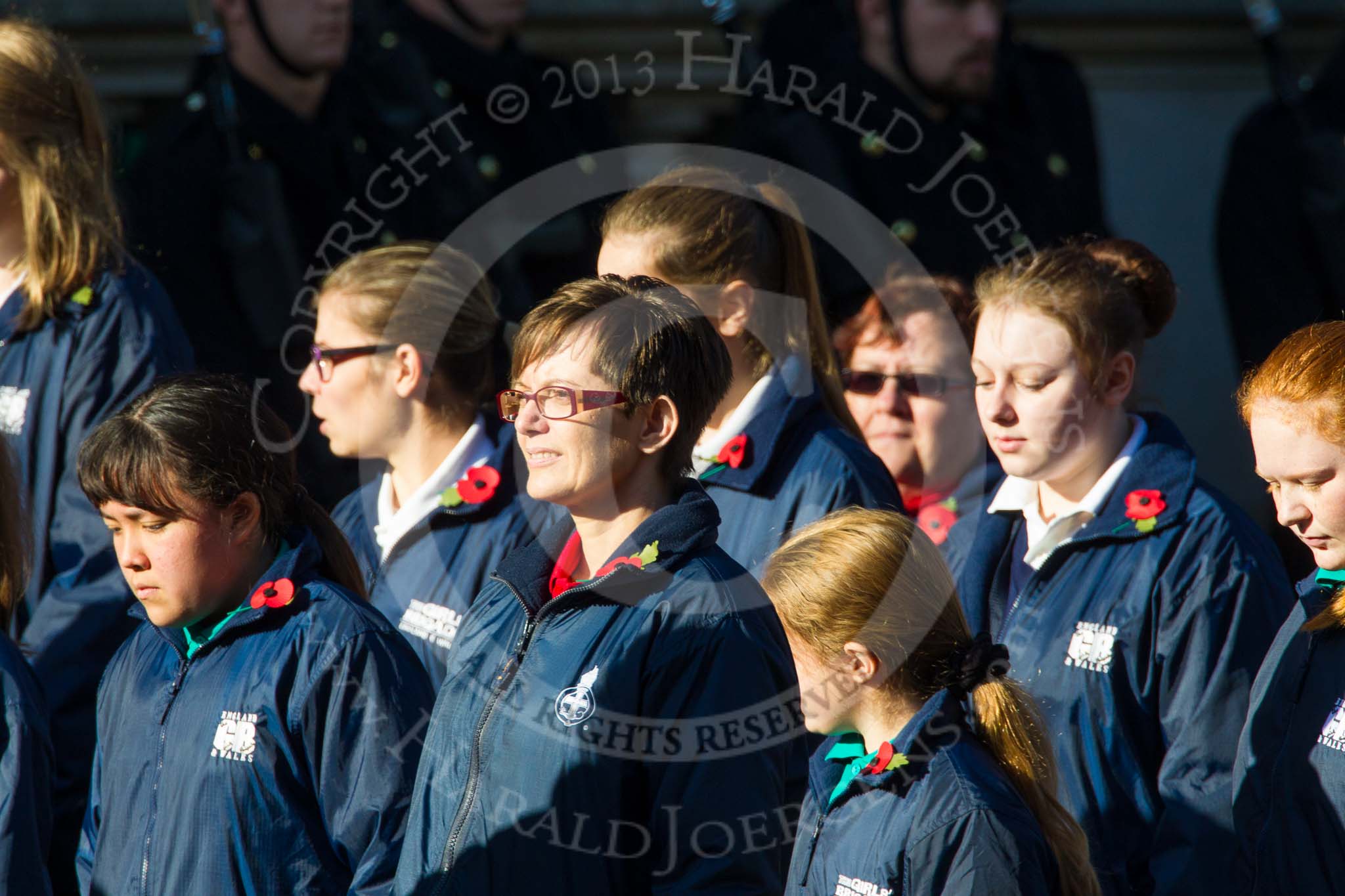 Remembrance Sunday at the Cenotaph in London 2014: Group M52 - Girls Brigade England & Wales.
Press stand opposite the Foreign Office building, Whitehall, London SW1,
London,
Greater London,
United Kingdom,
on 09 November 2014 at 12:22, image #2336