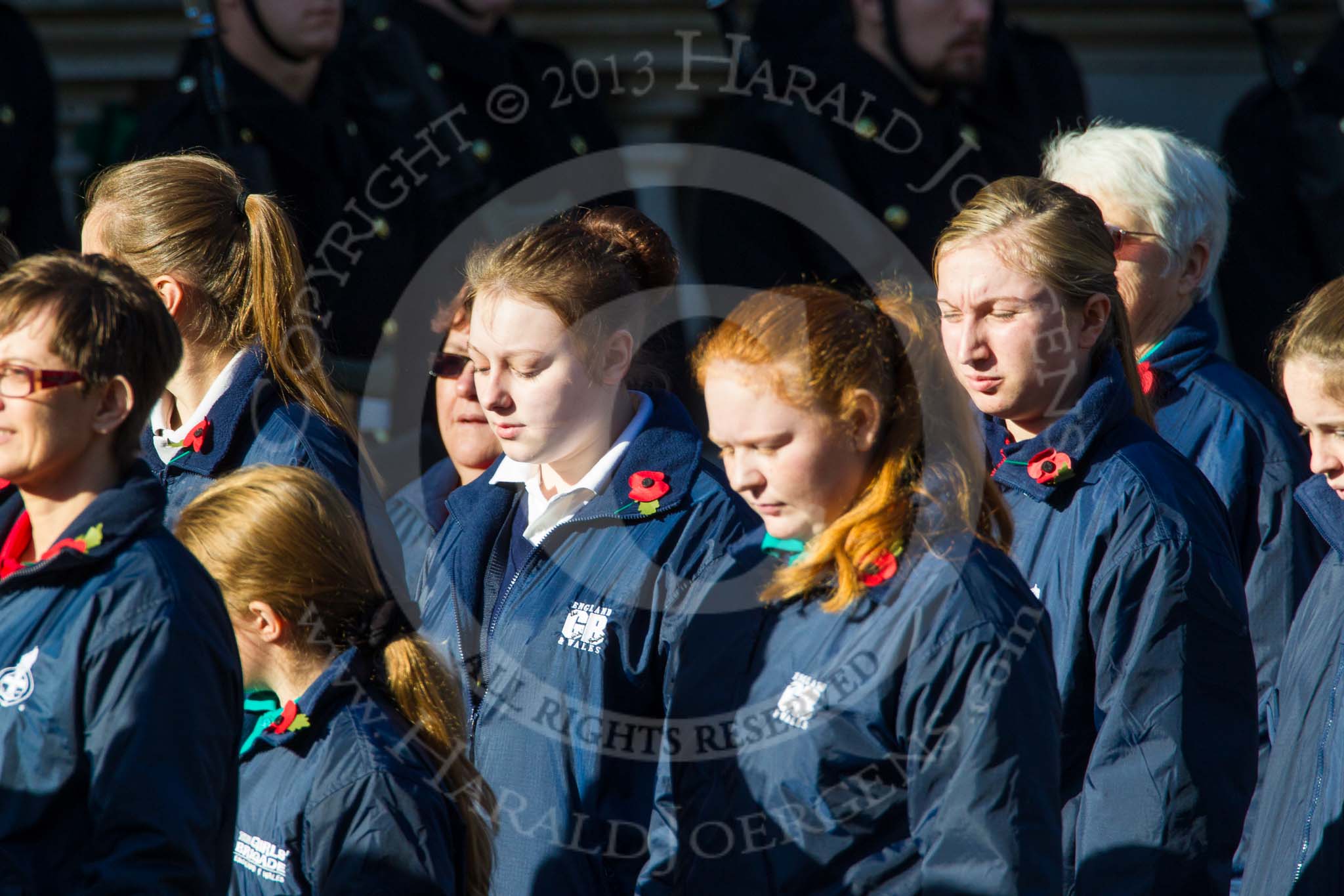 Remembrance Sunday at the Cenotaph in London 2014: Group M52 - Girls Brigade England & Wales.
Press stand opposite the Foreign Office building, Whitehall, London SW1,
London,
Greater London,
United Kingdom,
on 09 November 2014 at 12:22, image #2337
