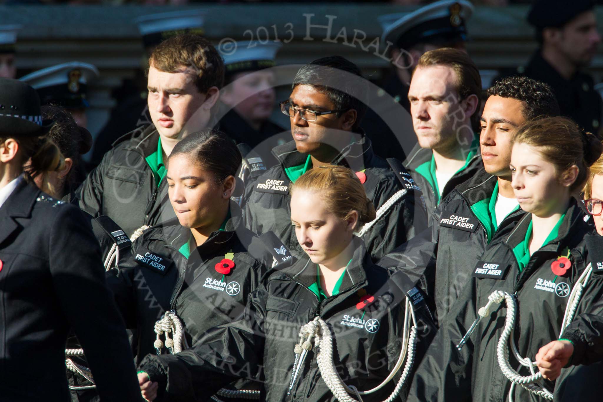 Remembrance Sunday at the Cenotaph in London 2014: Group M55 - St John Ambulance Cadets.
Press stand opposite the Foreign Office building, Whitehall, London SW1,
London,
Greater London,
United Kingdom,
on 09 November 2014 at 12:22, image #2361