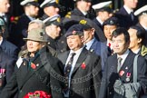 Remembrance Sunday at the Cenotaph in London 2014: Group D2 - Hong Kong Ex-Servicemen's Association (UK Branch).
Press stand opposite the Foreign Office building, Whitehall, London SW1,
London,
Greater London,
United Kingdom,
on 09 November 2014 at 11:43, image #280