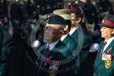 Remembrance Sunday at the Cenotaph in London 2014: Group D25 - Gurkha Brigade Association.
Press stand opposite the Foreign Office building, Whitehall, London SW1,
London,
Greater London,
United Kingdom,
on 09 November 2014 at 11:47, image #474