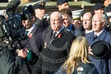Remembrance Sunday at the Cenotaph in London 2014: Group E8 - Fleet Air Arm Junglie Association.
Press stand opposite the Foreign Office building, Whitehall, London SW1,
London,
Greater London,
United Kingdom,
on 09 November 2014 at 11:51, image #649