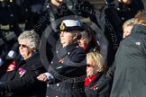 Remembrance Sunday at the Cenotaph in London 2014: Group E24 - Queen Alexandra's Royal Naval Nursing Service.
Press stand opposite the Foreign Office building, Whitehall, London SW1,
London,
Greater London,
United Kingdom,
on 09 November 2014 at 11:52, image #747