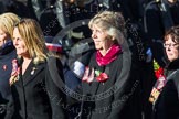 Remembrance Sunday at the Cenotaph in London 2014: Group E24 - Queen Alexandra's Royal Naval Nursing Service.
Press stand opposite the Foreign Office building, Whitehall, London SW1,
London,
Greater London,
United Kingdom,
on 09 November 2014 at 11:53, image #758