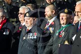 Remembrance Sunday at the Cenotaph in London 2014: Group E37 -Aircraft Handlers Association.
Press stand opposite the Foreign Office building, Whitehall, London SW1,
London,
Greater London,
United Kingdom,
on 09 November 2014 at 11:54, image #850
