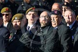 Remembrance Sunday at the Cenotaph in London 2014: Group B16 - Royal Pioneer Corps Association.
Press stand opposite the Foreign Office building, Whitehall, London SW1,
London,
Greater London,
United Kingdom,
on 09 November 2014 at 12:09, image #1679