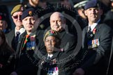 Remembrance Sunday at the Cenotaph in London 2014: Group B16 - Royal Pioneer Corps Association.
Press stand opposite the Foreign Office building, Whitehall, London SW1,
London,
Greater London,
United Kingdom,
on 09 November 2014 at 12:10, image #1692