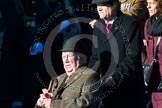 Remembrance Sunday at the Cenotaph in London 2014: Group M4 - Children of the Far East Prisoners of War.
Press stand opposite the Foreign Office building, Whitehall, London SW1,
London,
Greater London,
United Kingdom,
on 09 November 2014 at 12:15, image #1986