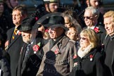Remembrance Sunday at the Cenotaph in London 2014: Group M4 - Children of the Far East Prisoners of War.
Press stand opposite the Foreign Office building, Whitehall, London SW1,
London,
Greater London,
United Kingdom,
on 09 November 2014 at 12:15, image #1992