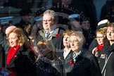Remembrance Sunday at the Cenotaph in London 2014: Group M23 - Civilians Representing Families.
Press stand opposite the Foreign Office building, Whitehall, London SW1,
London,
Greater London,
United Kingdom,
on 09 November 2014 at 12:18, image #2160