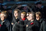 Remembrance Sunday at the Cenotaph in London 2014: Group M23 - Civilians Representing Families.
Press stand opposite the Foreign Office building, Whitehall, London SW1,
London,
Greater London,
United Kingdom,
on 09 November 2014 at 12:18, image #2164
