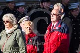 Remembrance Sunday at the Cenotaph in London 2014: Group M23 - Civilians Representing Families.
Press stand opposite the Foreign Office building, Whitehall, London SW1,
London,
Greater London,
United Kingdom,
on 09 November 2014 at 12:18, image #2166