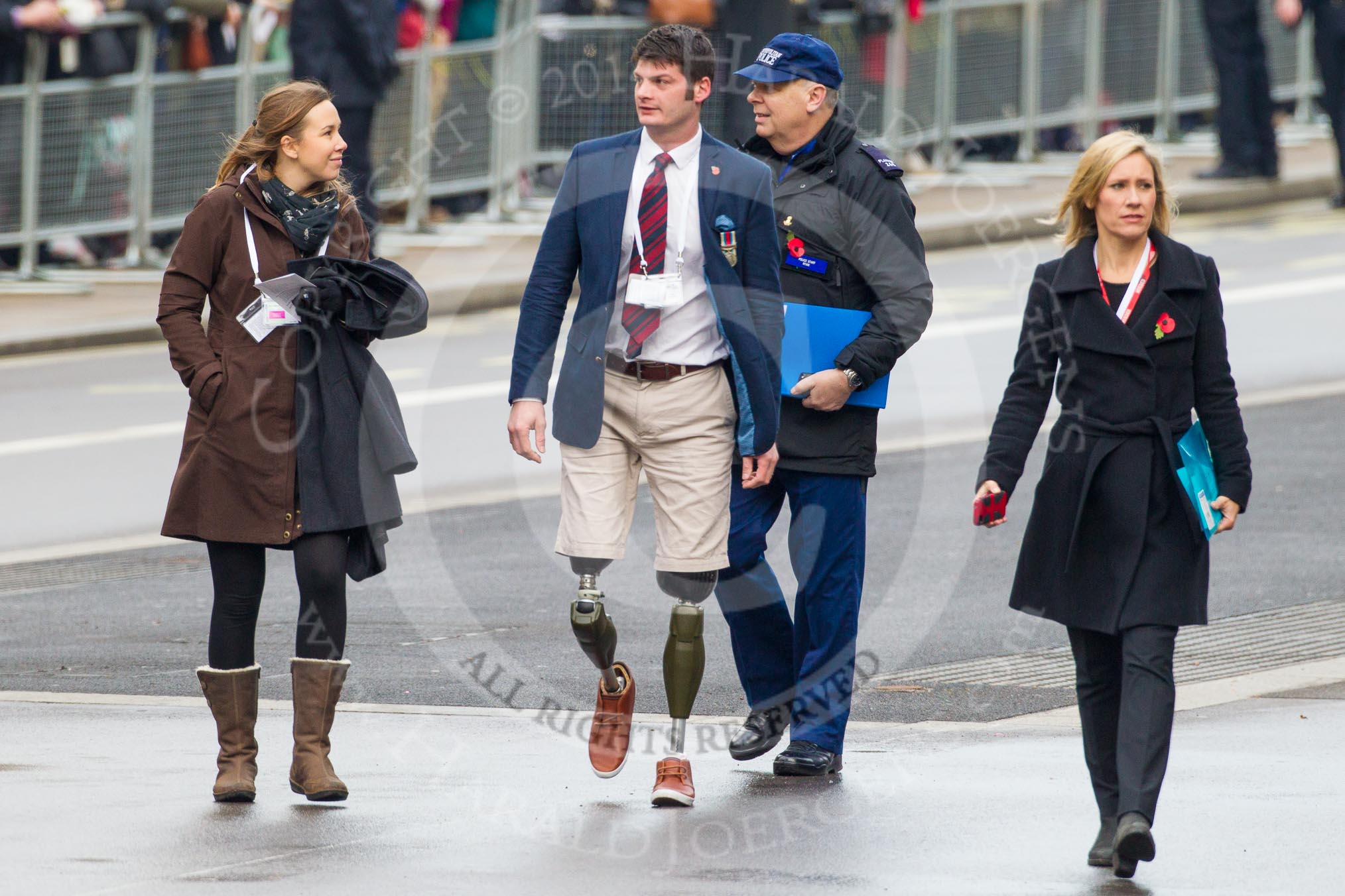 Remembrance Sunday at the Cenotaph in London 2014: Captain Dave Henson MBE, officer, double amputee, and athlete that took part in the Invictus Games, with the BBC's Sophie Rayworth (right)..
Press stand opposite the Foreign Office building, Whitehall, London SW1,
London,
Greater London,
United Kingdom,
on 09 November 2014 at 09:46, image #19