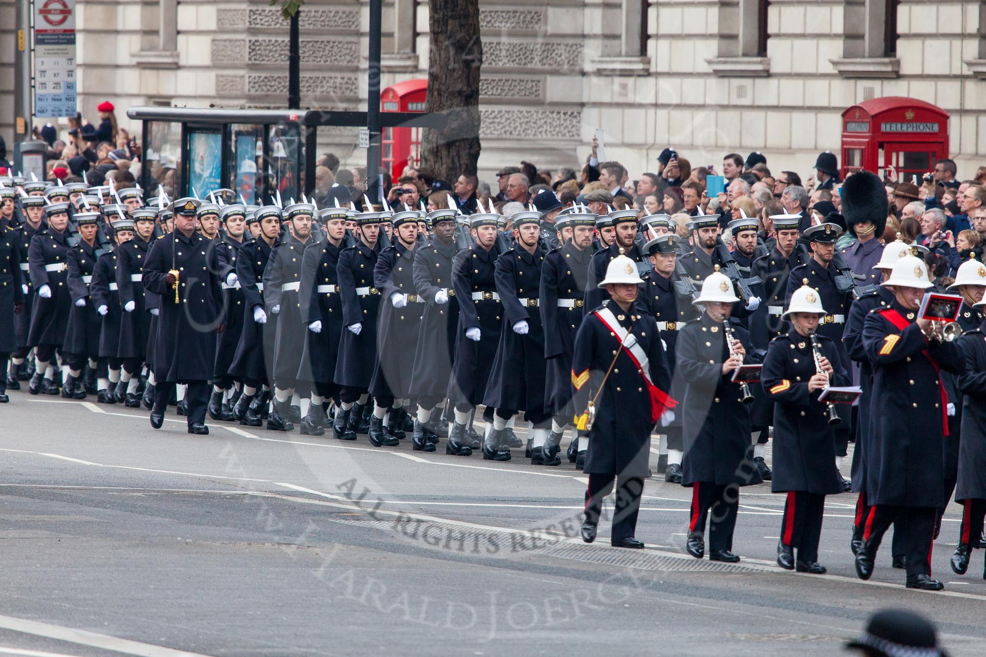 Remembrance Sunday at the Cenotaph in London 2014: The Band of the Royal Marines is followed by the Royal Navy detachment.
Press stand opposite the Foreign Office building, Whitehall, London SW1,
London,
Greater London,
United Kingdom,
on 09 November 2014 at 10:17, image #32