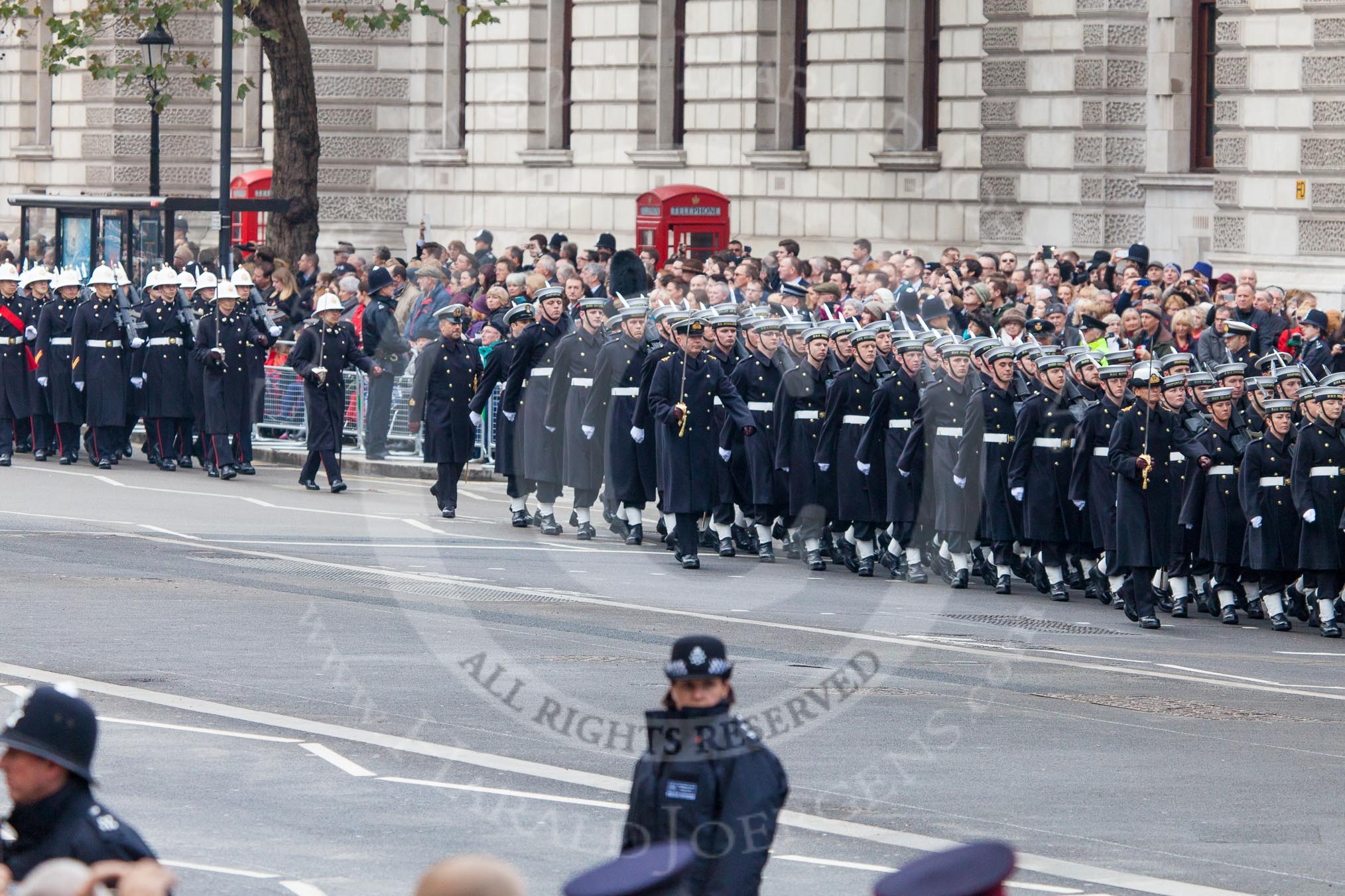 Remembrance Sunday at the Cenotaph in London 2014: The Royal Navy detachment is followed by the Royal Marines detachment, they will line the northern side of Whitehall together.
Press stand opposite the Foreign Office building, Whitehall, London SW1,
London,
Greater London,
United Kingdom,
on 09 November 2014 at 10:17, image #34