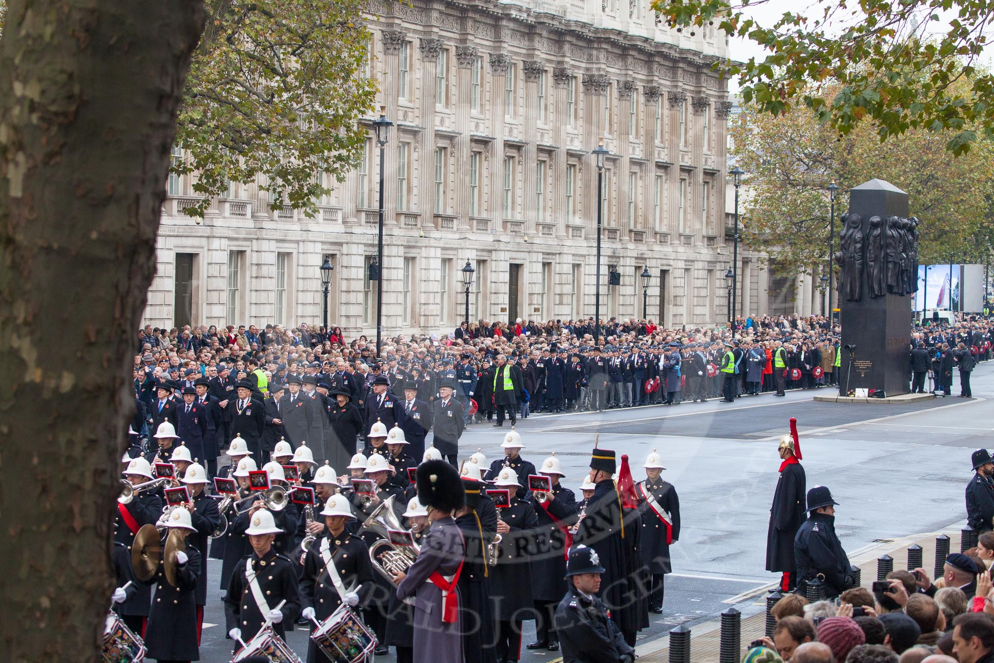 Remembrance Sunday at the Cenotaph in London 2014: The Band of the Royal Marines, behind them the first column of veterans.
Press stand opposite the Foreign Office building, Whitehall, London SW1,
London,
Greater London,
United Kingdom,
on 09 November 2014 at 10:19, image #40