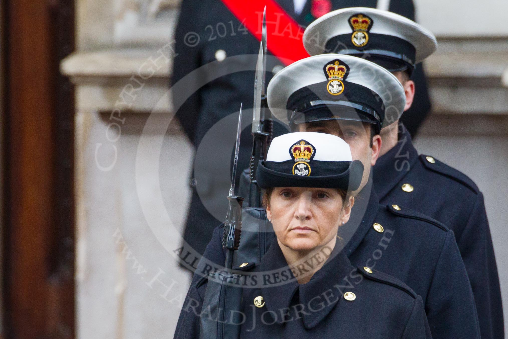 Remembrance Sunday at the Cenotaph in London 2014: Members of the Royal Navy detachment at the door of the Foreign- and Commonwealth Office.
Press stand opposite the Foreign Office building, Whitehall, London SW1,
London,
Greater London,
United Kingdom,
on 09 November 2014 at 10:20, image #46