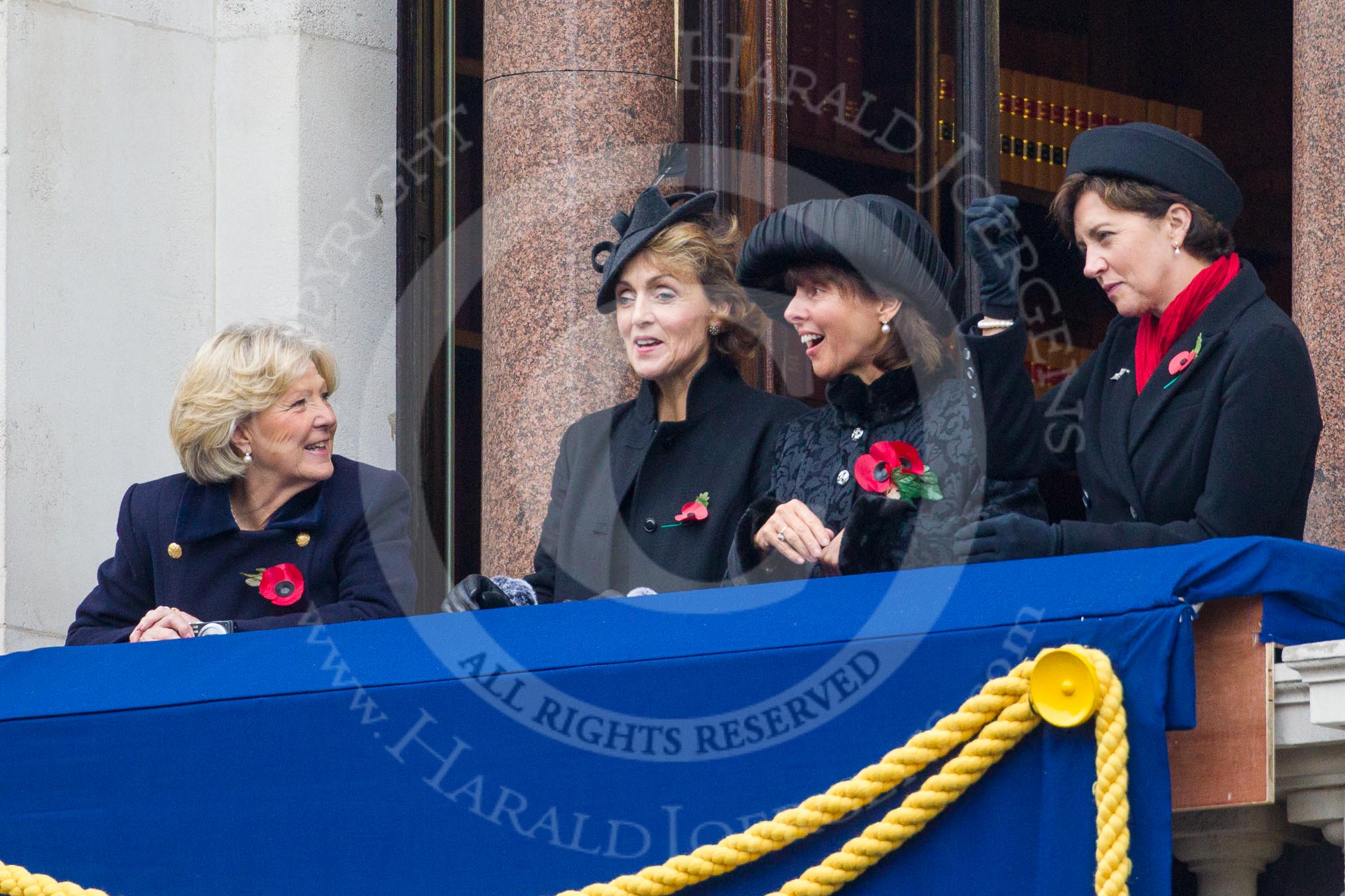 Remembrance Sunday at the Cenotaph in London 2014: Guests on one of the balconies of the Foreign- and Commonwealth Office.
Press stand opposite the Foreign Office building, Whitehall, London SW1,
London,
Greater London,
United Kingdom,
on 09 November 2014 at 10:22, image #53