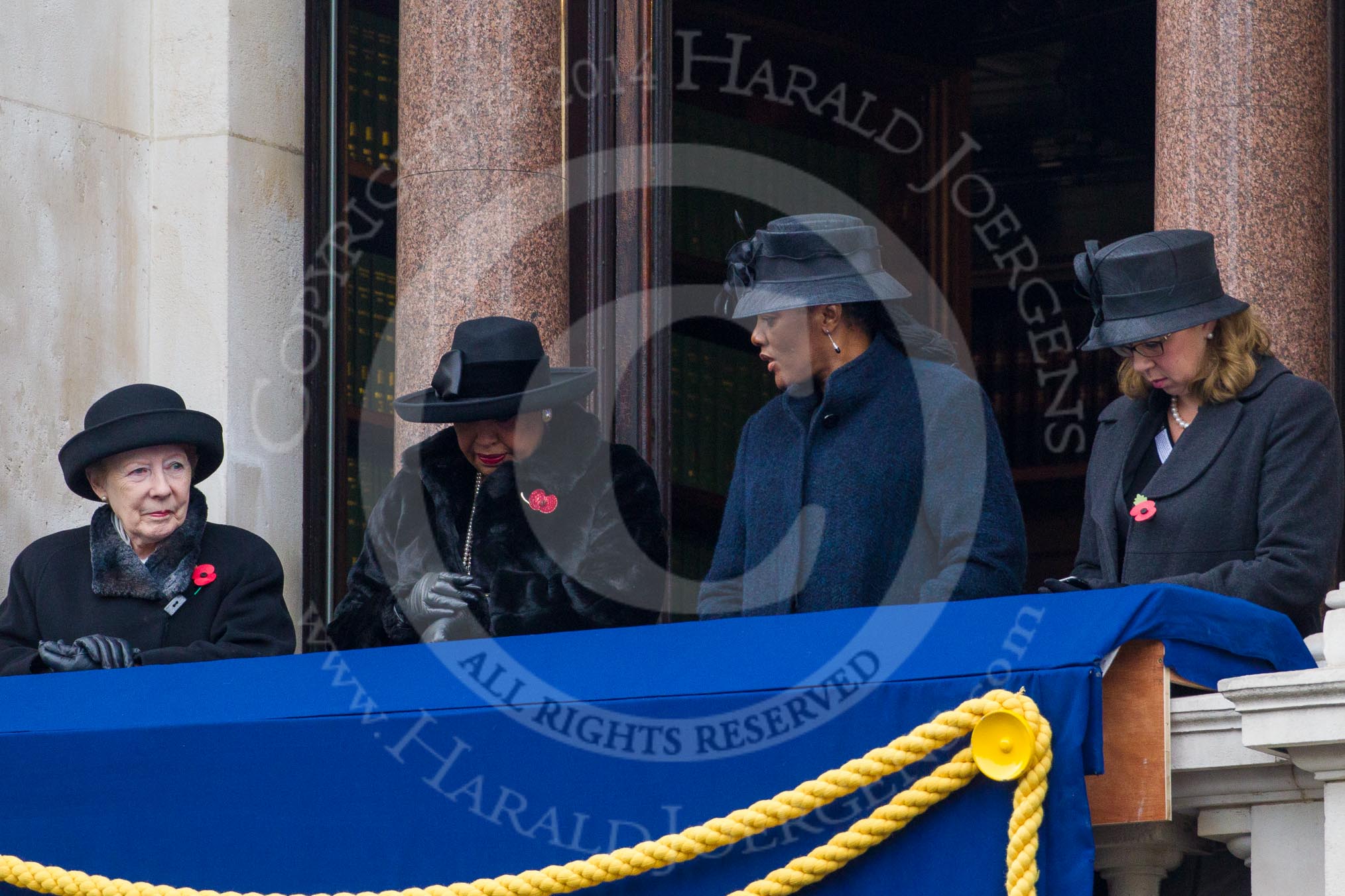 Remembrance Sunday at the Cenotaph in London 2014: Guests on one of the balconies of the Foreign- and Commonwealth Office.
Press stand opposite the Foreign Office building, Whitehall, London SW1,
London,
Greater London,
United Kingdom,
on 09 November 2014 at 10:22, image #54