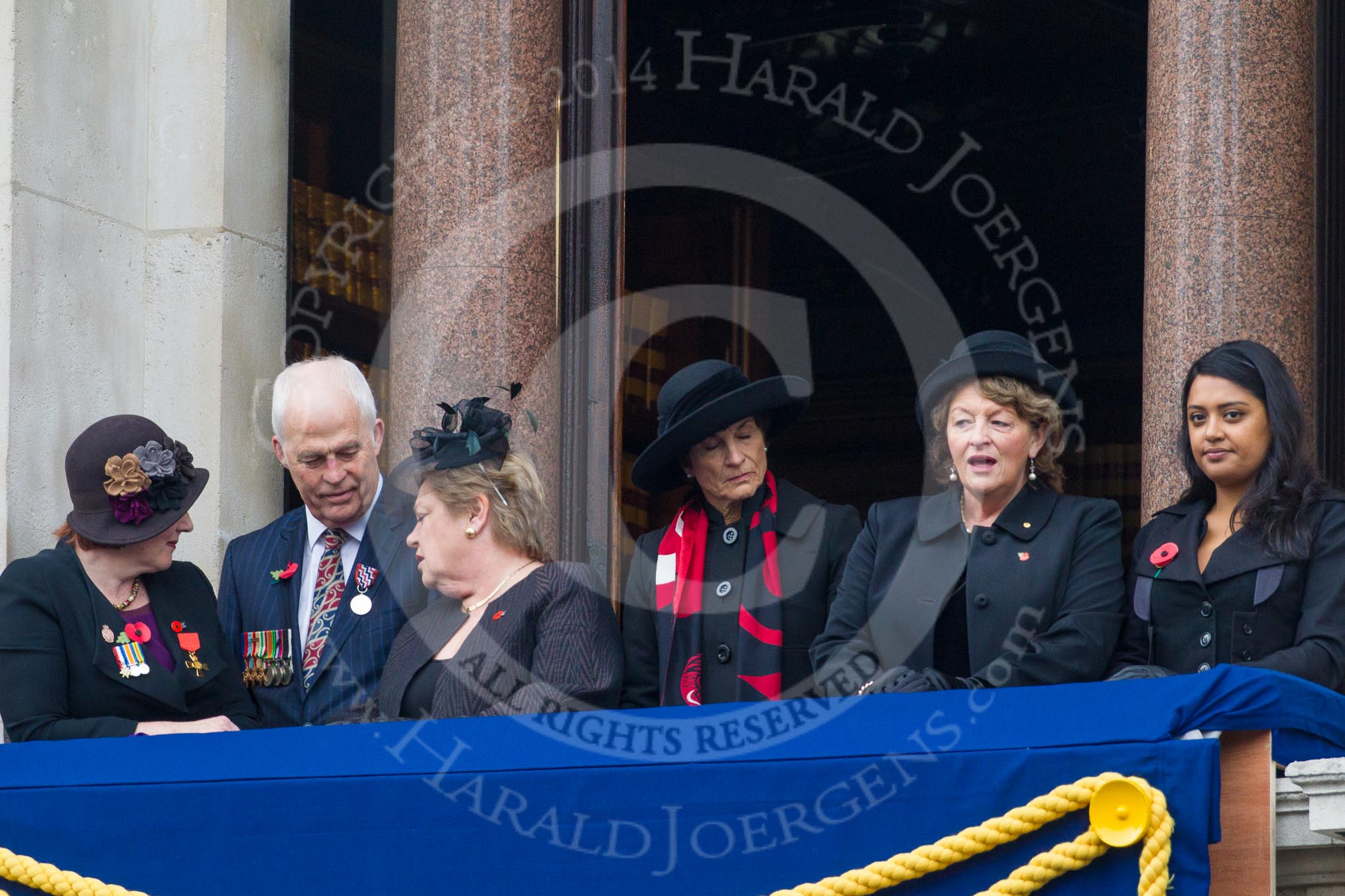 Remembrance Sunday at the Cenotaph in London 2014: Guests on one of the balconies of the Foreign- and Commonwealth Office.
Press stand opposite the Foreign Office building, Whitehall, London SW1,
London,
Greater London,
United Kingdom,
on 09 November 2014 at 10:22, image #55