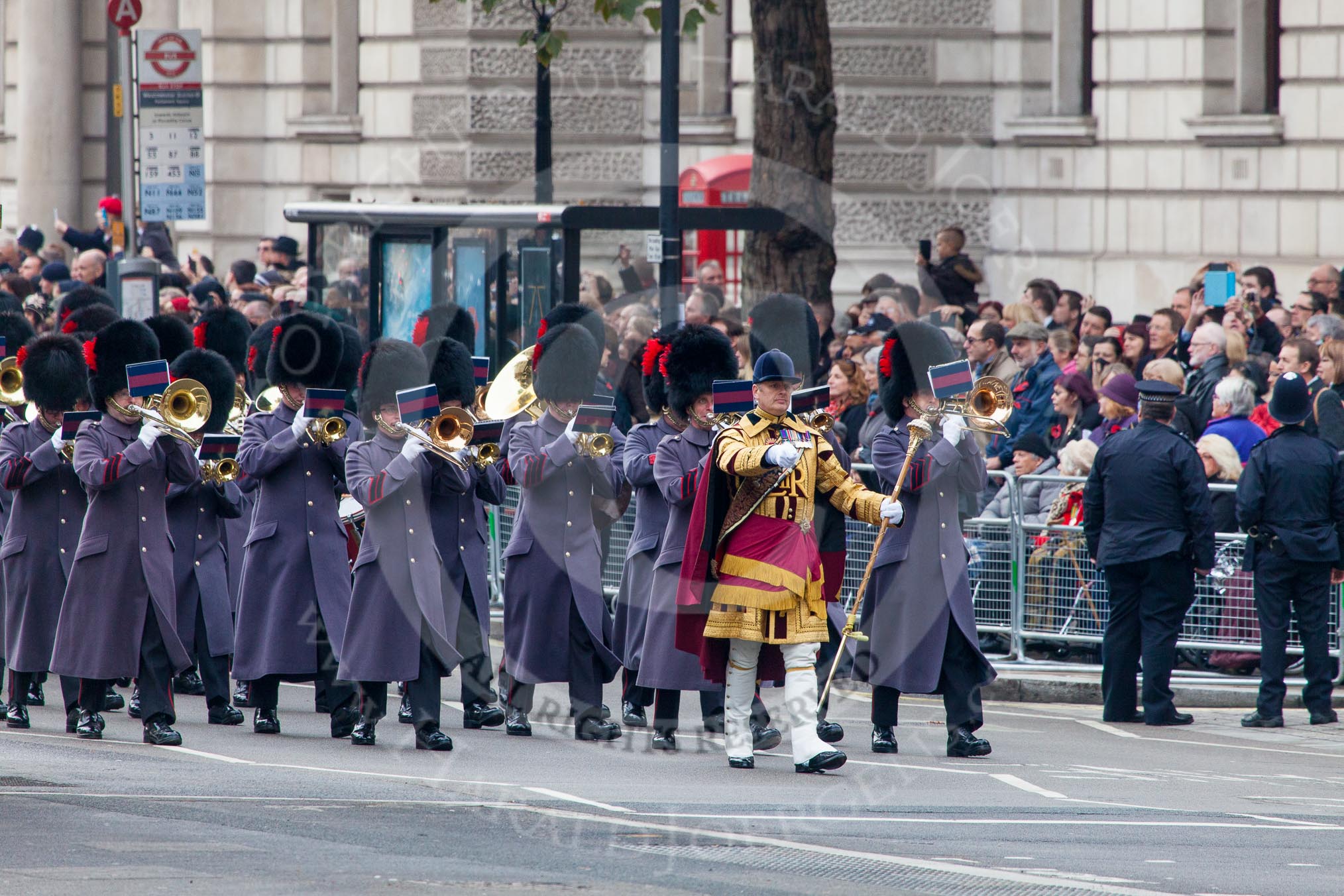 Remembrance Sunday at the Cenotaph in London 2014: Drum Major Tony Taylor, Coldstream Guards, leading the Band of the Coldstream Guard onto Whitehall.
Press stand opposite the Foreign Office building, Whitehall, London SW1,
London,
Greater London,
United Kingdom,
on 09 November 2014 at 10:24, image #57