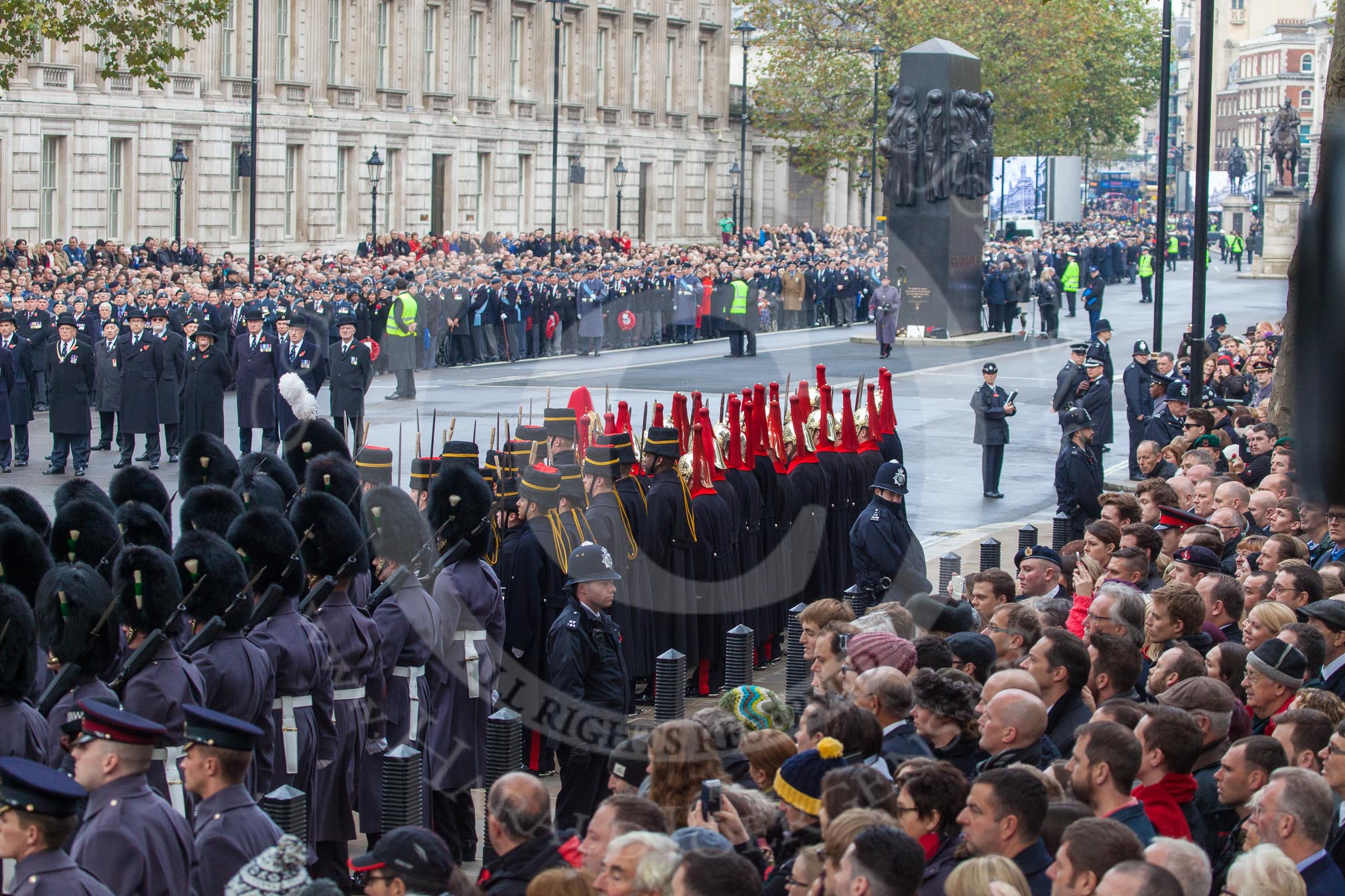 Remembrance Sunday at the Cenotaph in London 2014: The line-up of Welsh Guards, Royal Horse Artillery, and Household Cavalry on the southern side of Whitehall.
Press stand opposite the Foreign Office building, Whitehall, London SW1,
London,
Greater London,
United Kingdom,
on 09 November 2014 at 10:26, image #66