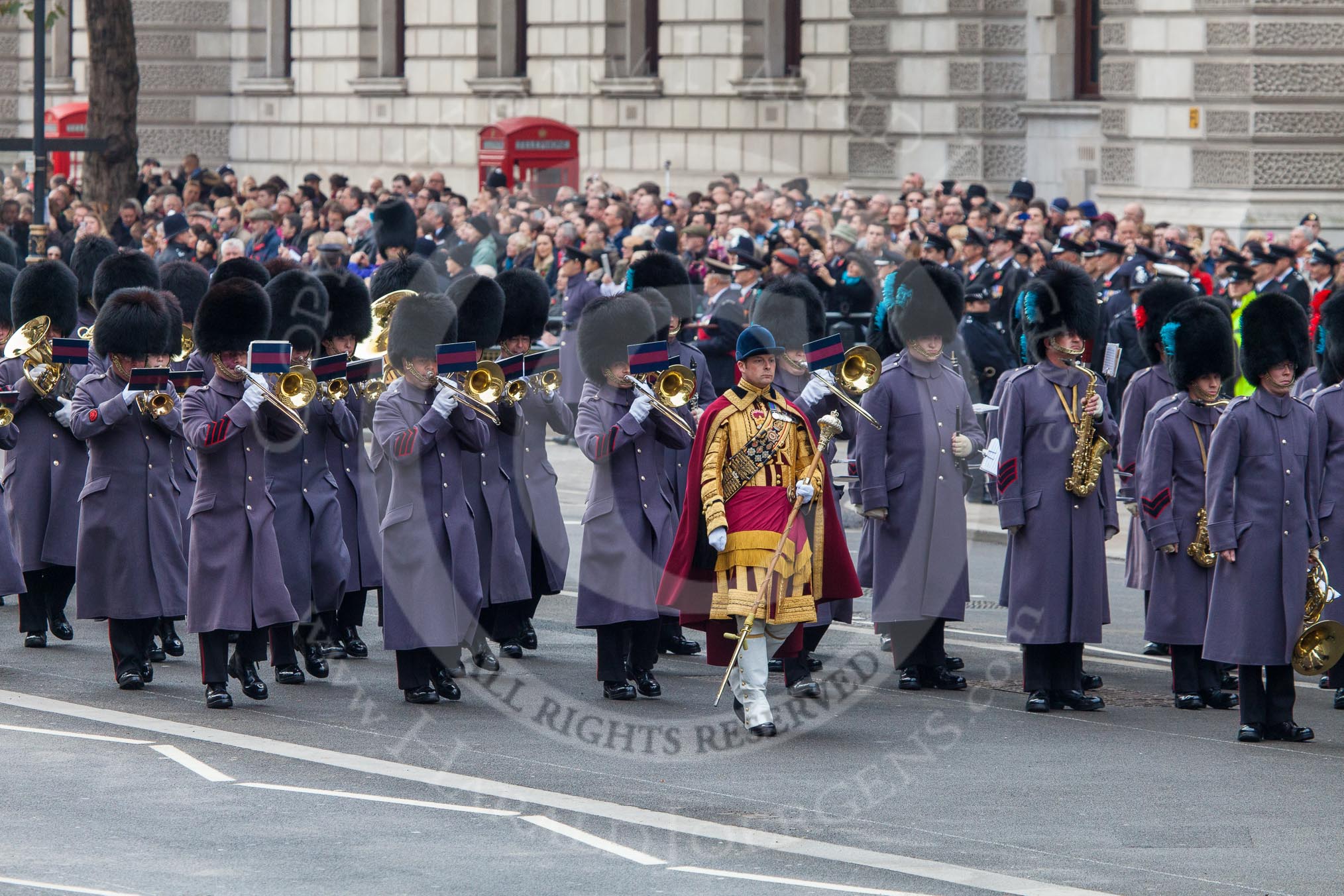 Remembrance Sunday at the Cenotaph in London 2014: Senior Drum Major Matthew Betts, Grenadier Guards, leading the band of the  Scots Guards onto Whitehall.
Press stand opposite the Foreign Office building, Whitehall, London SW1,
London,
Greater London,
United Kingdom,
on 09 November 2014 at 10:29, image #67