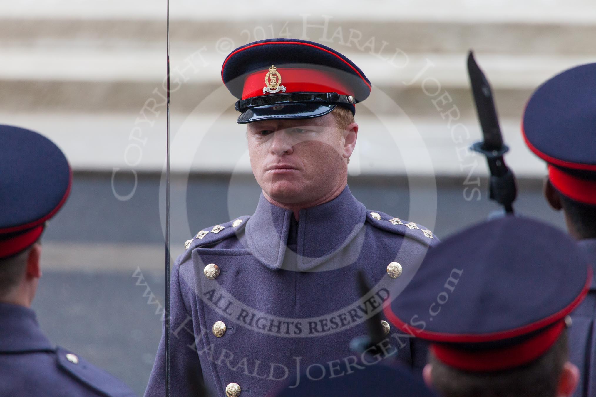 Remembrance Sunday at the Cenotaph in London 2014: A Captain of the Adjutant General's Corps with his detachment.
Press stand opposite the Foreign Office building, Whitehall, London SW1,
London,
Greater London,
United Kingdom,
on 09 November 2014 at 10:30, image #73